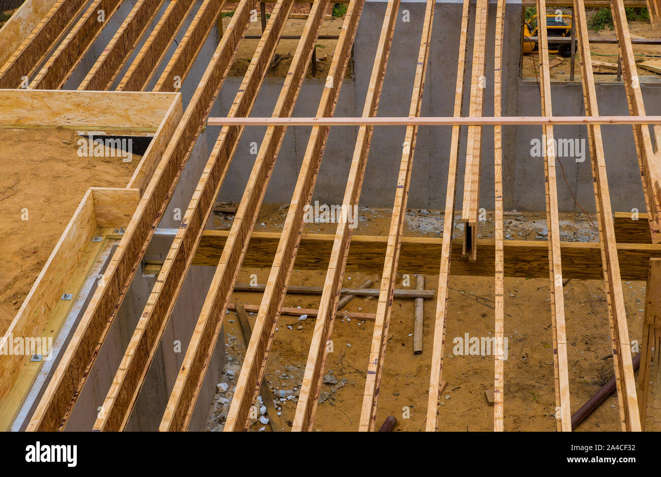 House framing floor construction showing massive solid wood joists