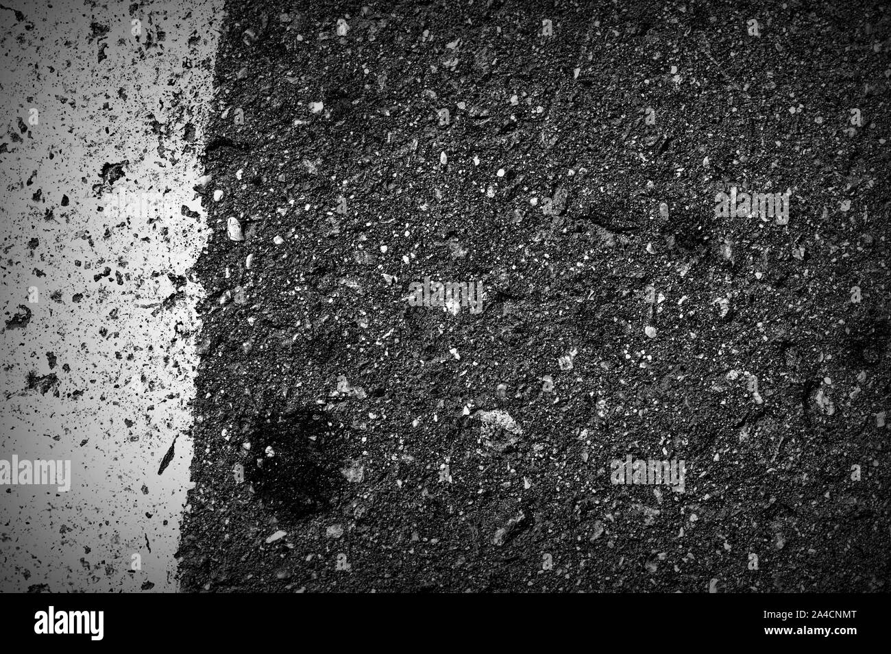 Old dirty asphalt texture with white paint on it. Top view Stock Photo