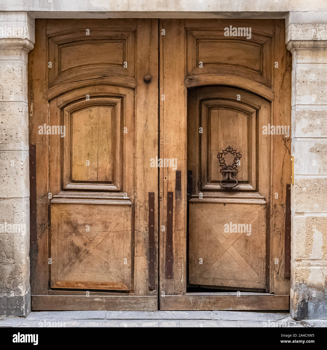 Paris, ancient wooden door in the Marais, typical architecture Stock ...