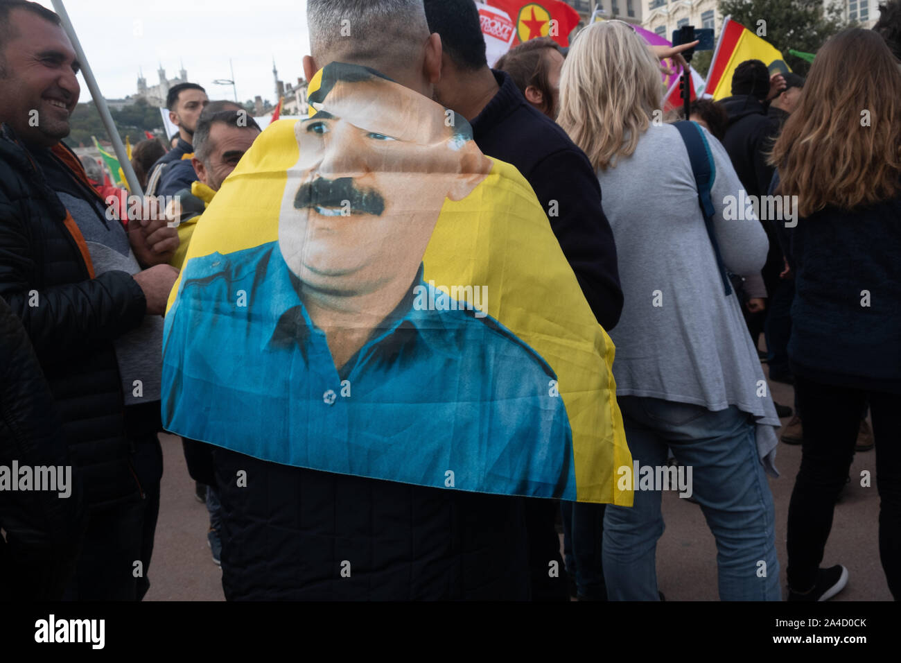 On 12 October 2019, Lyon, Auvergne-Rhône-Alpes, France. Demonstration against Turkish strikes in Syria. A flag bearing the effigy of Abdullah Öcalan, Stock Photo