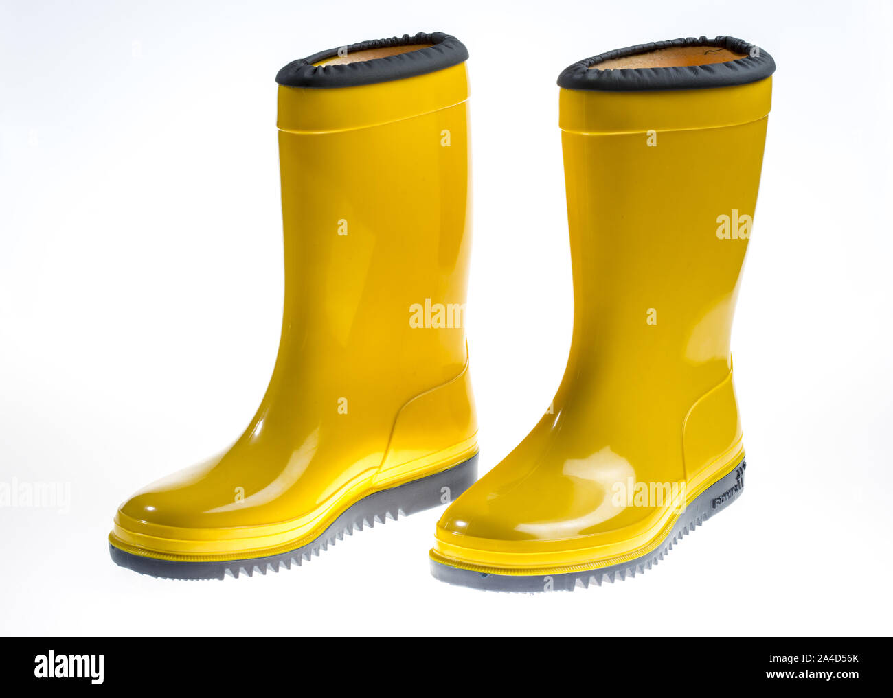 Yellow rubber boots, child size Stock Photo - Alamy