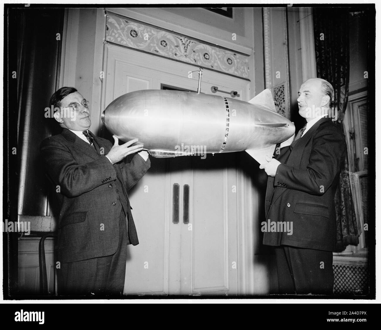 The new 'flying tube' airship. Washington, D.C., Mar. 14. Immediate commercial development of a new lighter-than-air airship of novel design, which its engineering sponsors believe will revolutionize air transportation, bringing safety, speed, load capacity, and easy maneuverability to airship performance, was announced today. Air sucked through the tube will create a vacuum in front and give a propulsive kick at the outlet. Universal joints will be located at the entrance and exit of the tube, moving in any direction of the air intake and outlet, thus steering the flying tube. The ship will b Stock Photo