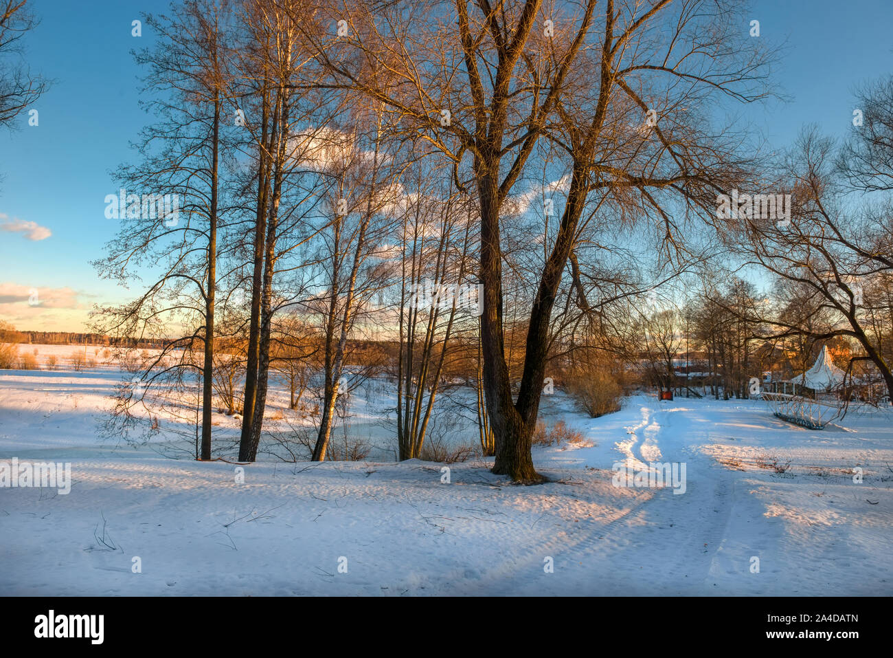 Empty road through snow hi-res stock photography and images - Alamy