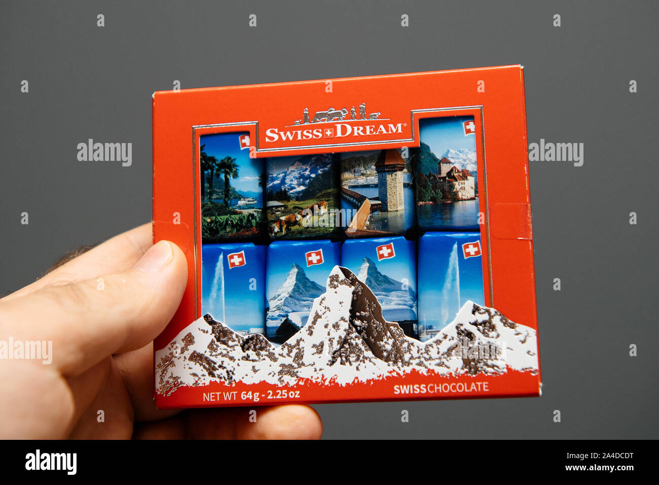 Paris, France - Sep 15, 2019: Man hand holding Swiss Dream