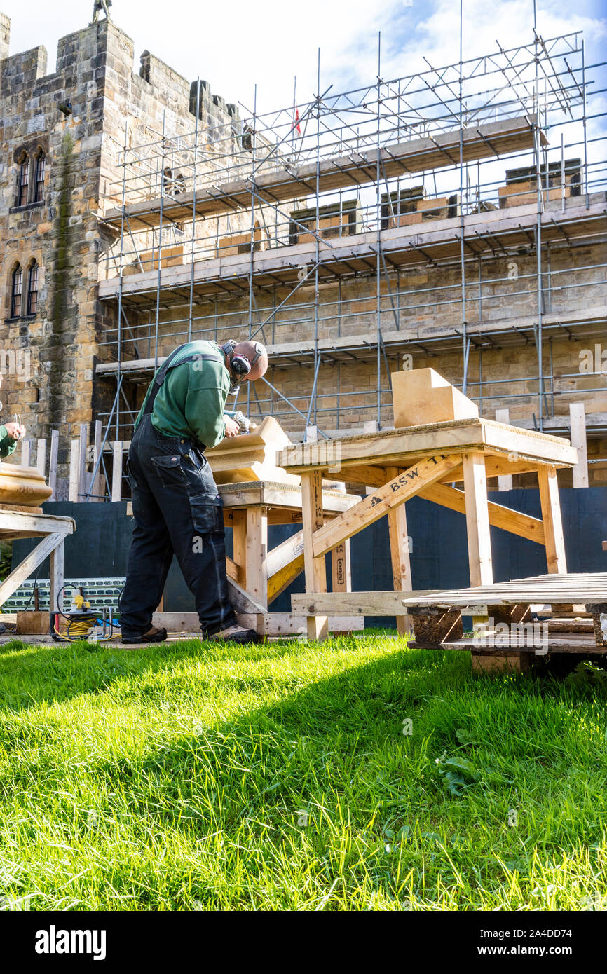 Stonemason, carving stone, stone mason, working using hammer and chisel