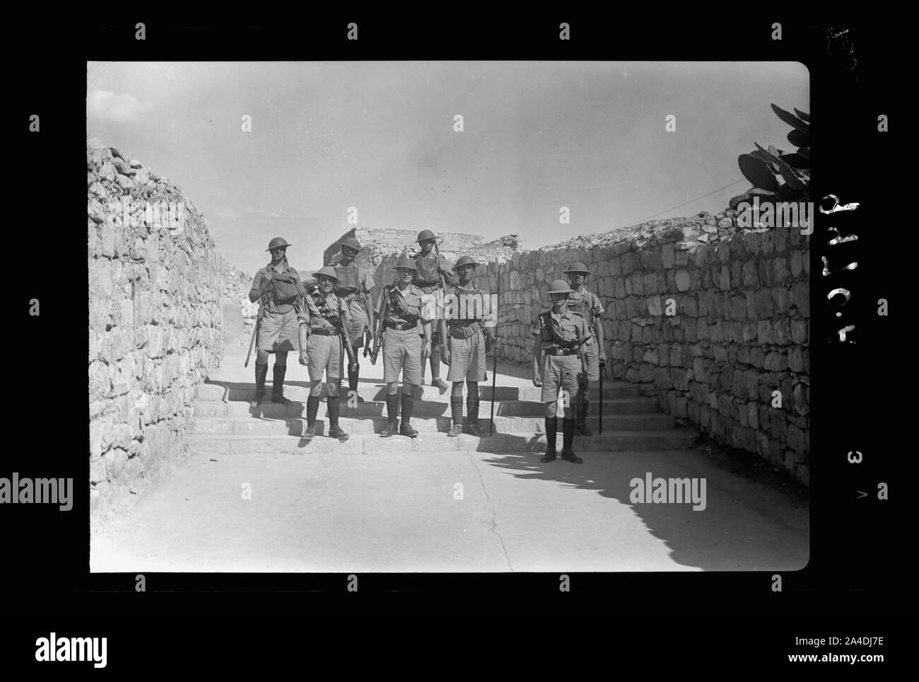 The raising of the siege of Jerusalem. Typical scene of troops in Old City before the lifting of curfew, troops descending the stairs Stock Photo