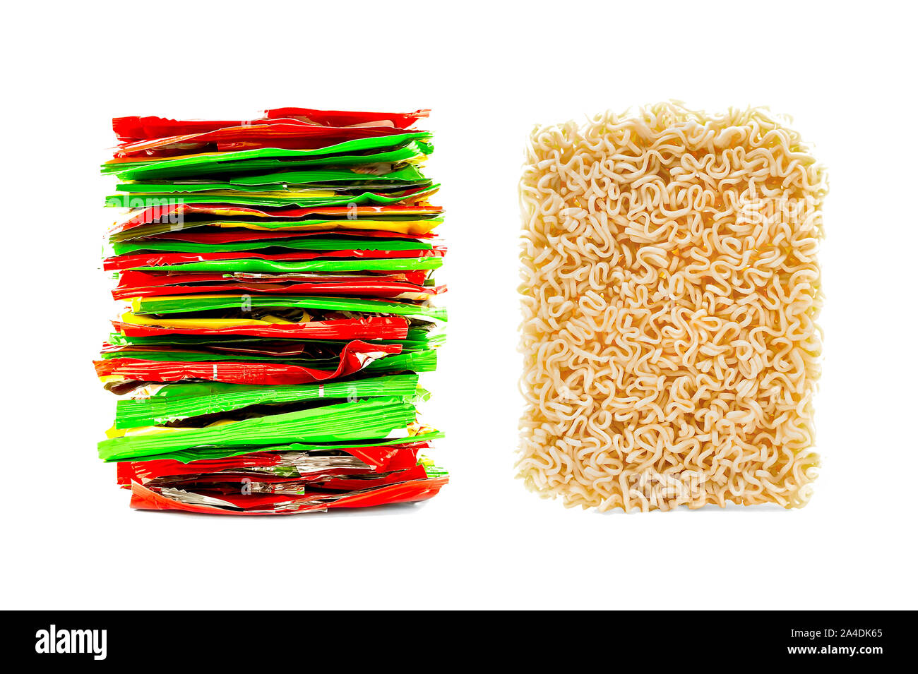 Stack of Multicolored Foil Plastic Bags and Block of Dried Instant Noodles, Ramen Isolated on White Background. Fast Food, Recycling, Workaholic, Stud Stock Photo