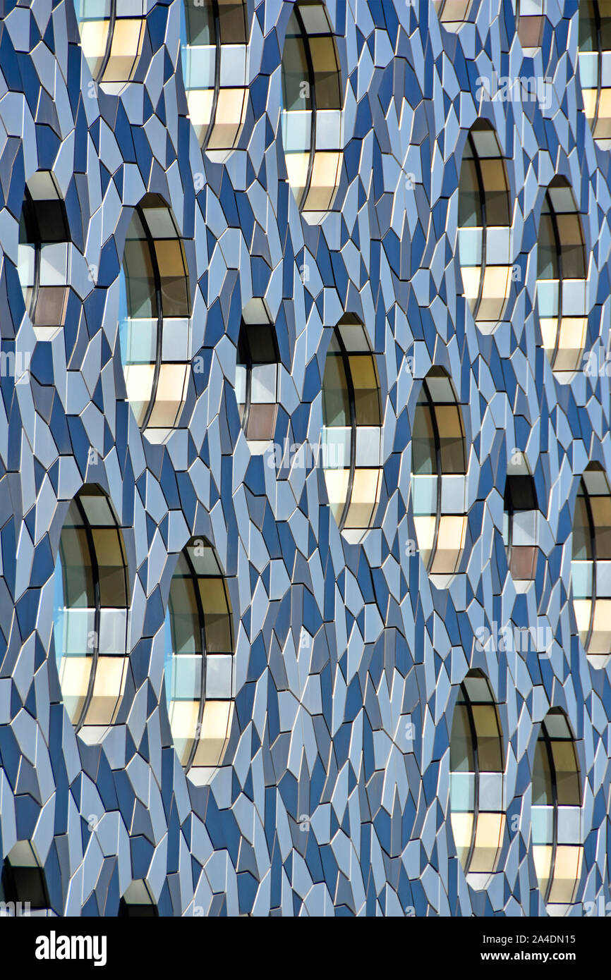 Abstract modern architecture background pattern & shapes formed of part external facade elevation of building design Greenwich London England UK Stock Photo