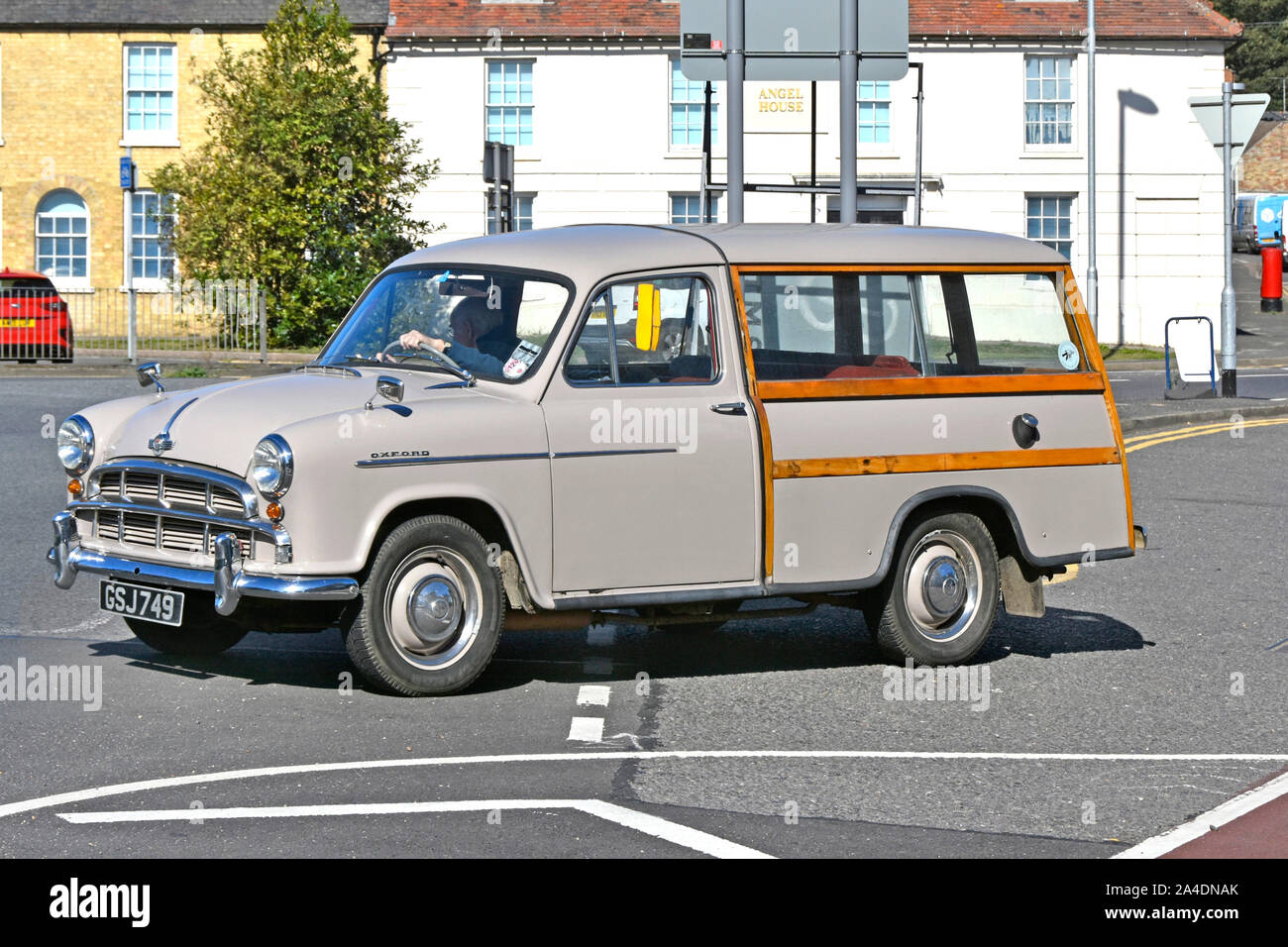 Side & front view of Morris Oxford Estate Car mass produced at Cowley Oxford in 1950s this street scene 2019 driving in Ely Cambridgeshire England UK Stock Photo
