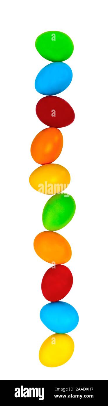 Stacked easter eggs on white Stock Photo