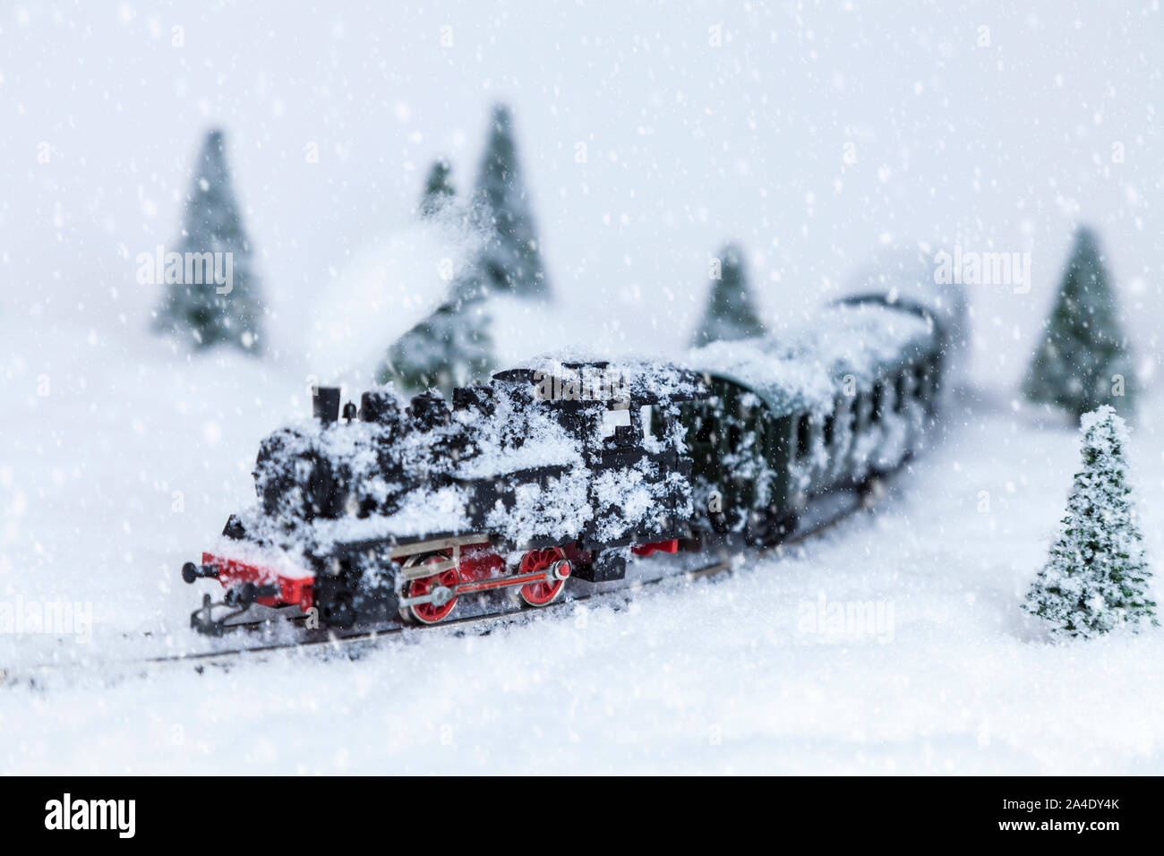 Passenger train in snowy winter landscape Stock Photo