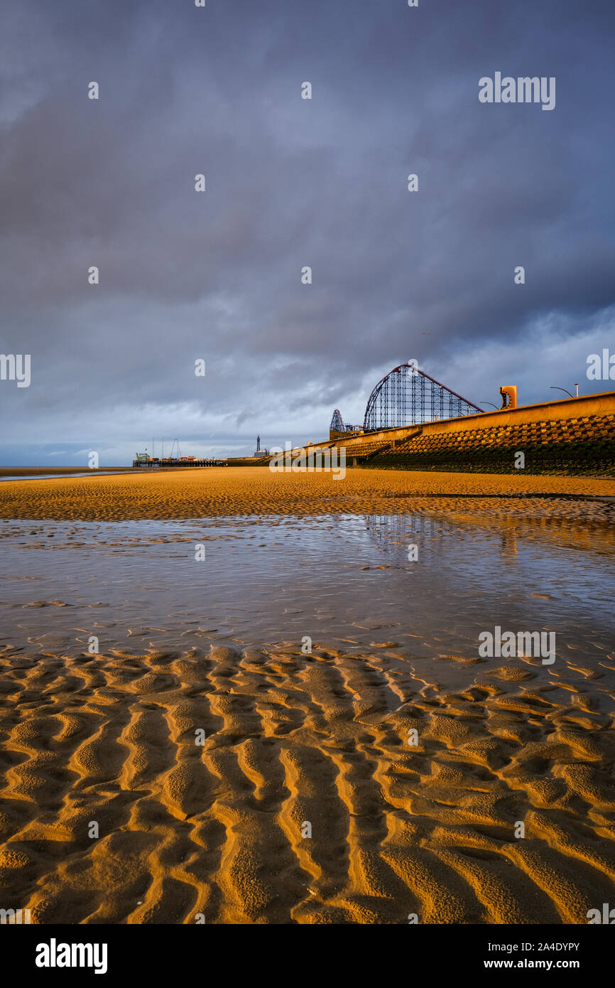 Blackpool's South Shore beach looking towards the Pleasure Beach and The Big One in the distance Stock Photo