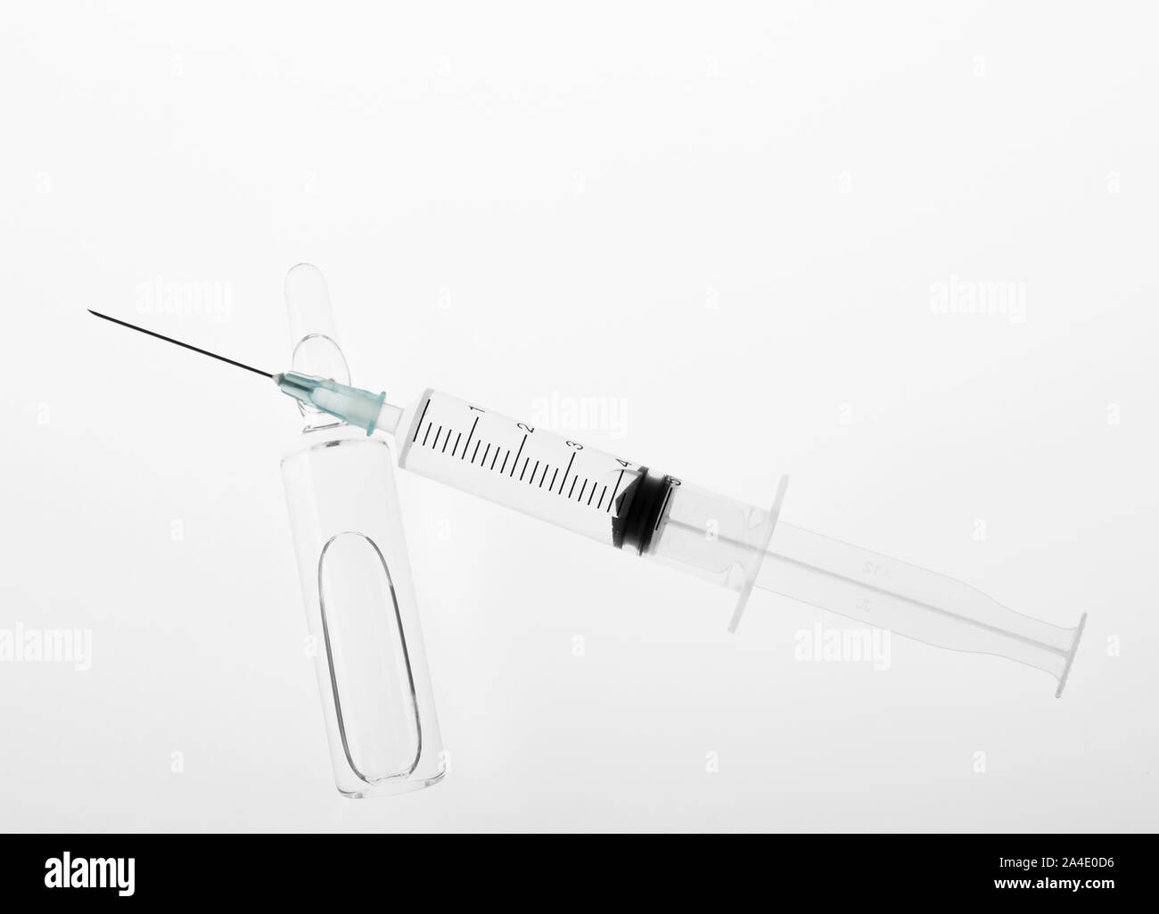 Download Glass Medicine Ampoule With Liquid And Syringe On White Background Stock Photo Alamy PSD Mockup Templates