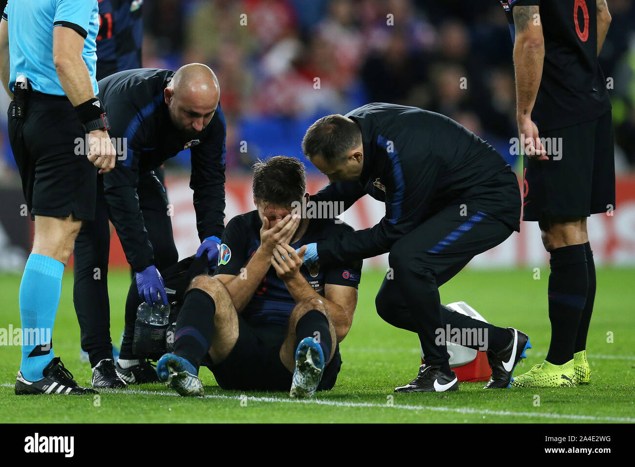 Cardiff, UK. 13th Oct, 2019. Bruno Petkovic of Croatia is treated for an injury. UEFA Euro 2020 qualifier match, Wales v Croatia at the Cardiff city Stadium in Cardiff, South Wales on Sunday 13th October 2019. pic by Andrew Orchard /Andrew Orchard sports photography/Alamy live News EDITORIAL USE ONLY Credit: Andrew Orchard sports photography/Alamy Live News Stock Photo