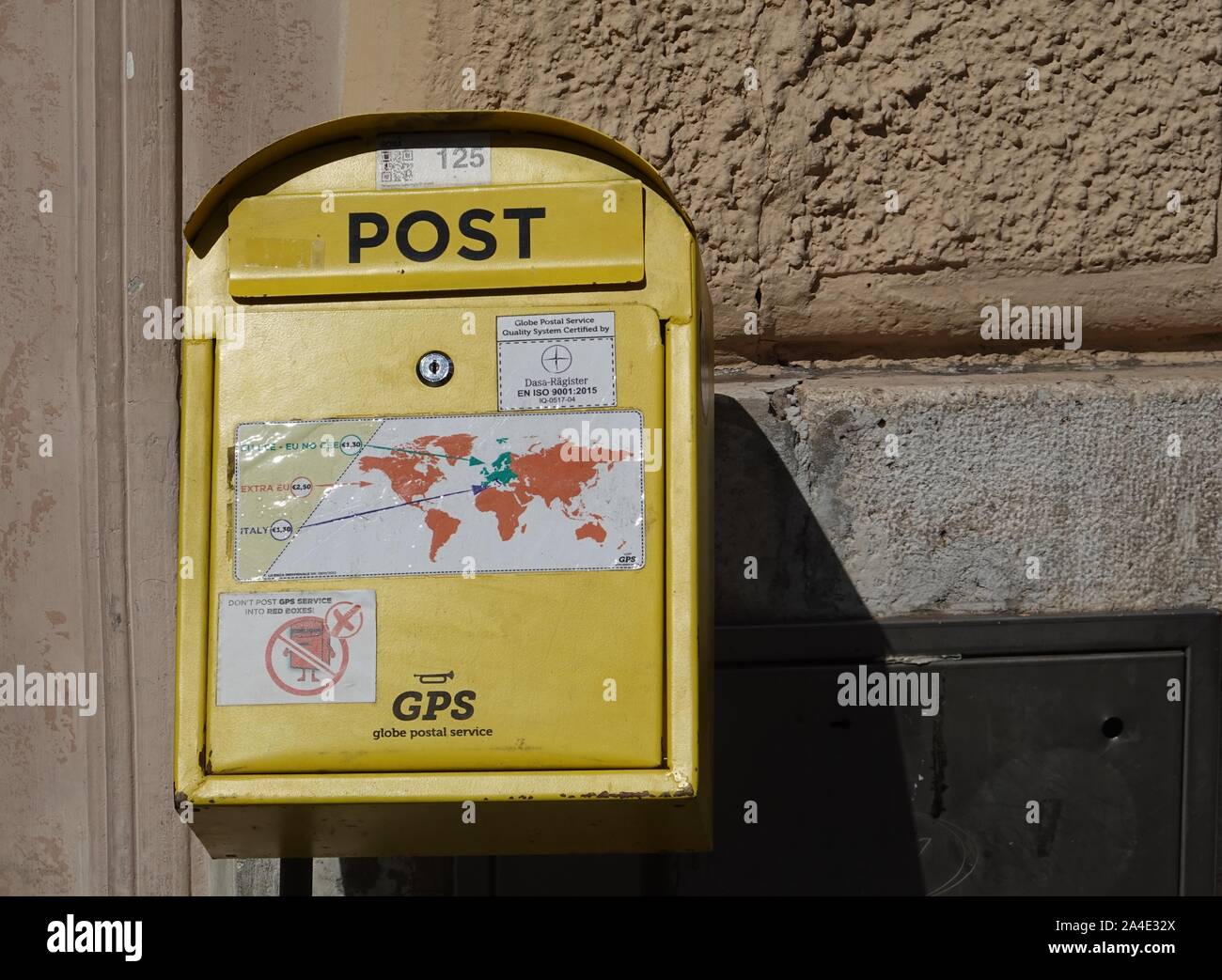 GPS yellow postbox Rome, Italy Stock Photo - Alamy