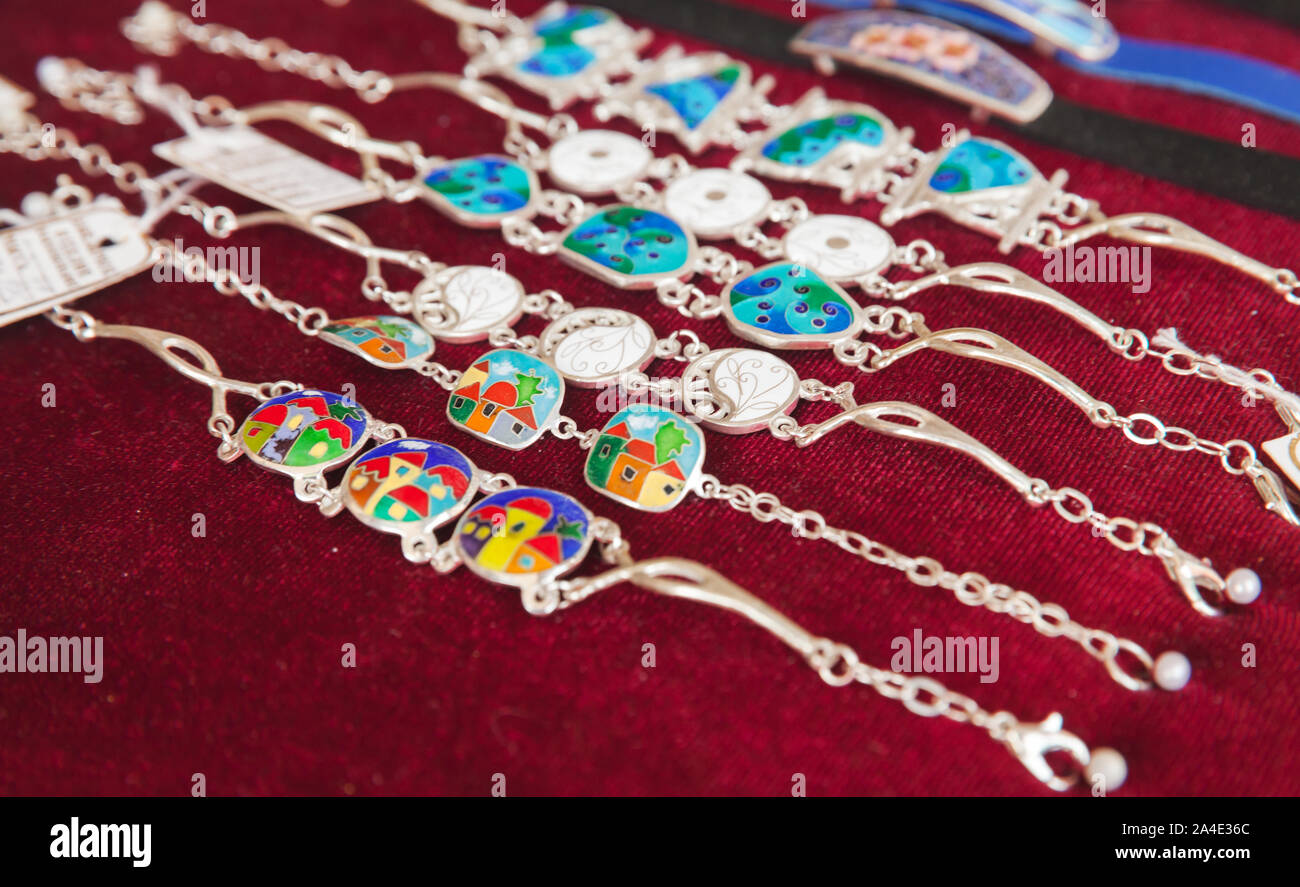 Tbilisi, Georgia - April 28, 2019: Handmade bracelets made by Minankari or cloisonne enamel technique are on a counter of local gift shop. This tradit Stock Photo