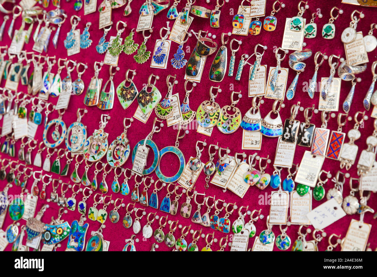 Tbilisi, Georgia - April 28, 2019: Collection of Georgian handmade jewelry is on a counter of local shop. This jewelry technique Minankari or cloisonn Stock Photo