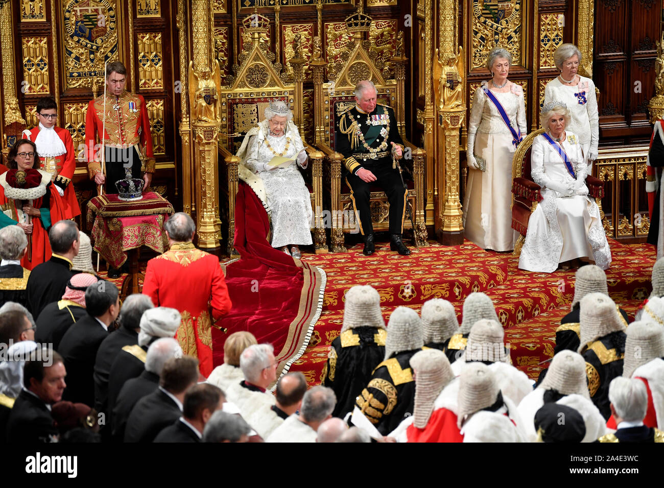 Queen Elizabeth II, accompanied by the Prince of Wales, delivers the Queen's Speech during the State Opening of Parliament in the House of Lords at the Palace of Westminster in London. Stock Photo