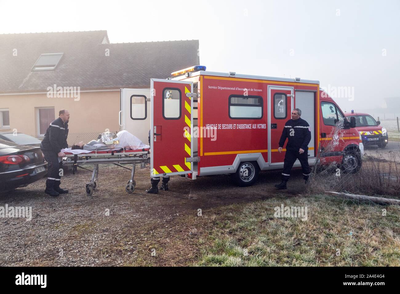 RESCUE OPERATION WITH THE FIREFIGHTERS FOR A PREGNANT WOMAN ABOUT TO GIVE BIRTH IN HER HOME, ALENCON (61), FRANCE Stock Photo