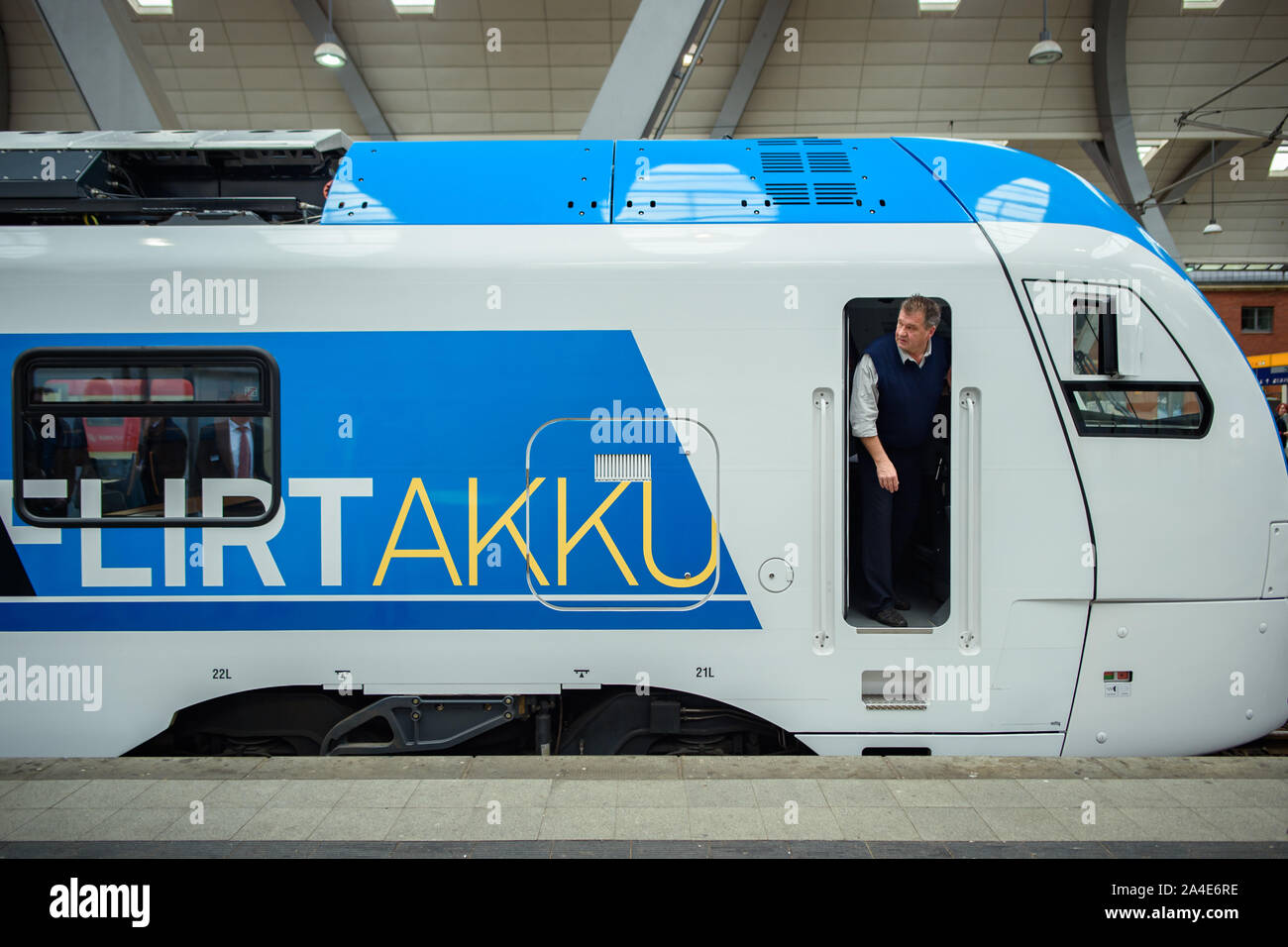Kiel, Germany. 14th Oct, 2019. The locomotive driver Michael Rusche is standing in the driver's cab of a 'FLIRT Akku' test train of Stadler Pankow GmbH at Kiel main station. Stadler and the Schleswig-Holstein public transport association have signed a supply contract for 55 battery-powered railcars. The first battery multiple units are to be deployed in the northern and eastern networks of Schleswig-Holstein at the end of 2022. Credit: dpa picture alliance/Alamy Live News Stock Photo