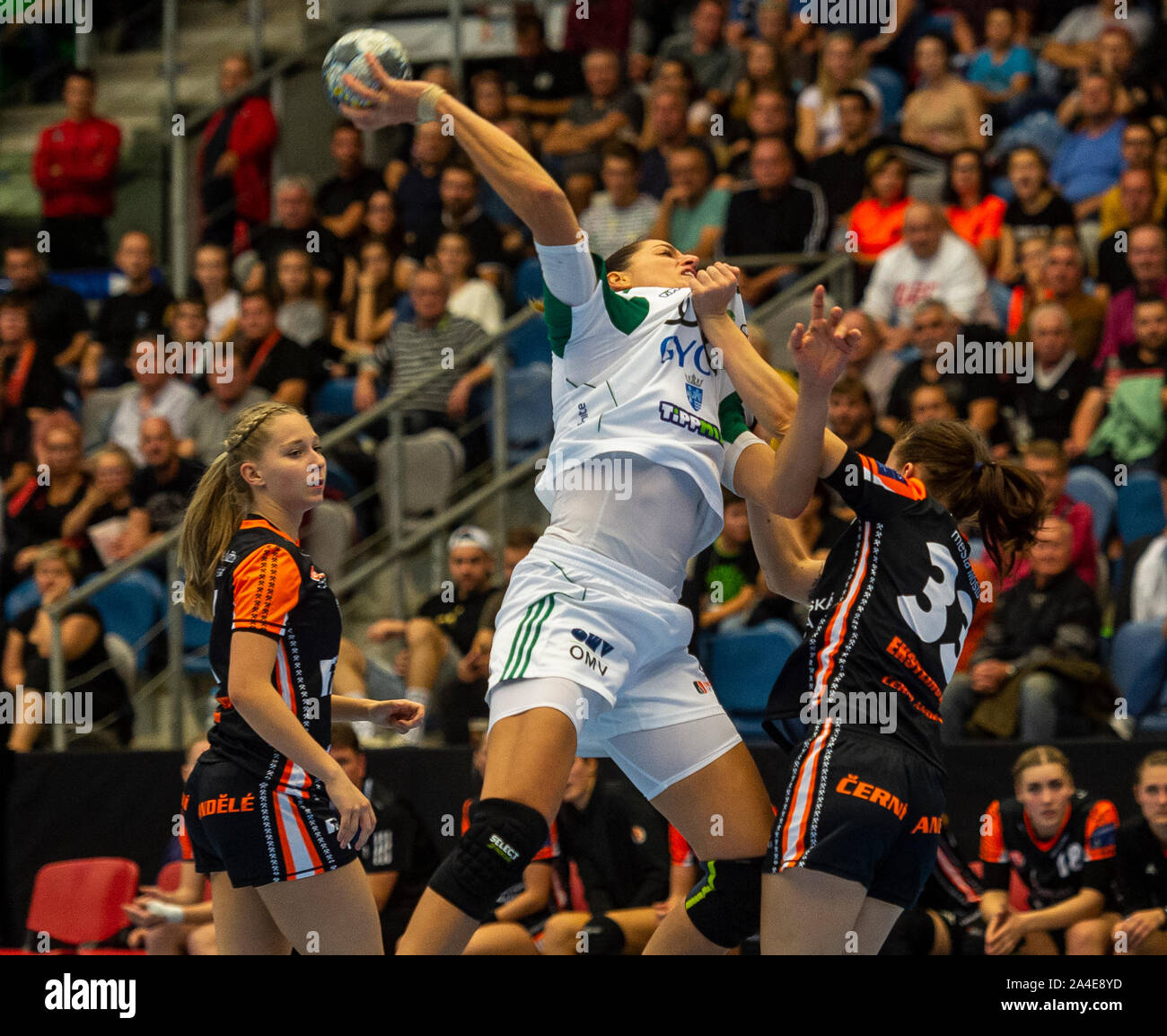 (L-R)  Veronika Dvorakova of Most, Eduarda Amorim of Gyor and Tereza Eksteinova of Most in action during the women's handball Champions League 2nd round match DHK Banik Most vs Gyori Audi ETO KC in Chomutov, Czech Republic, October 13, 2019. (CTK Photo/Ondrej Hajek) Stock Photo