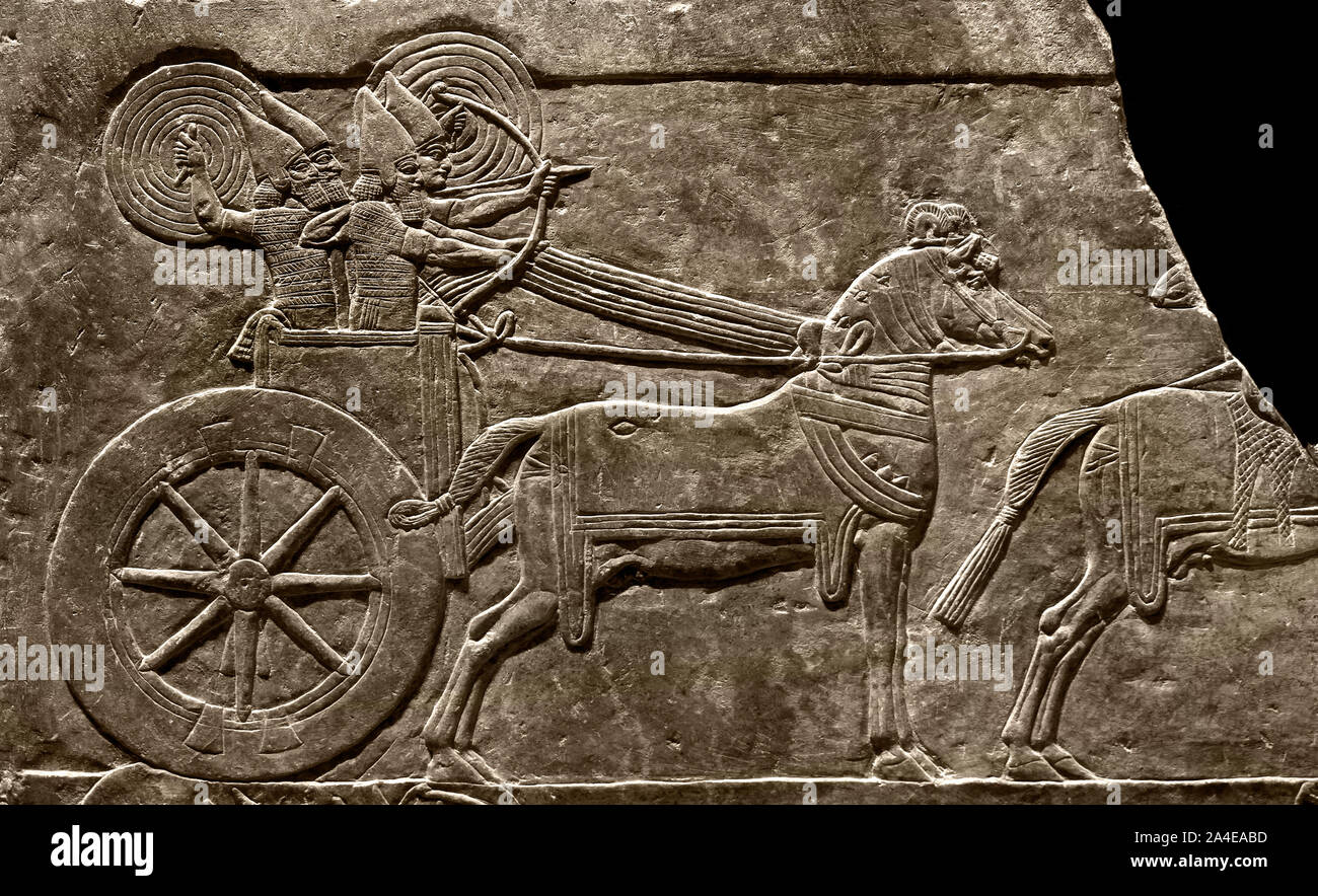 Chariot and riders of the Assyrian army Around 645 BC Nineveh, Assurbanipal Palace. ( Assurbanipal or Ashurbanipal, was King of the Neo-Assyrian Empire from 668 BC to c. 627 BC ) King of Assyria - King of Babylon. Stock Photo