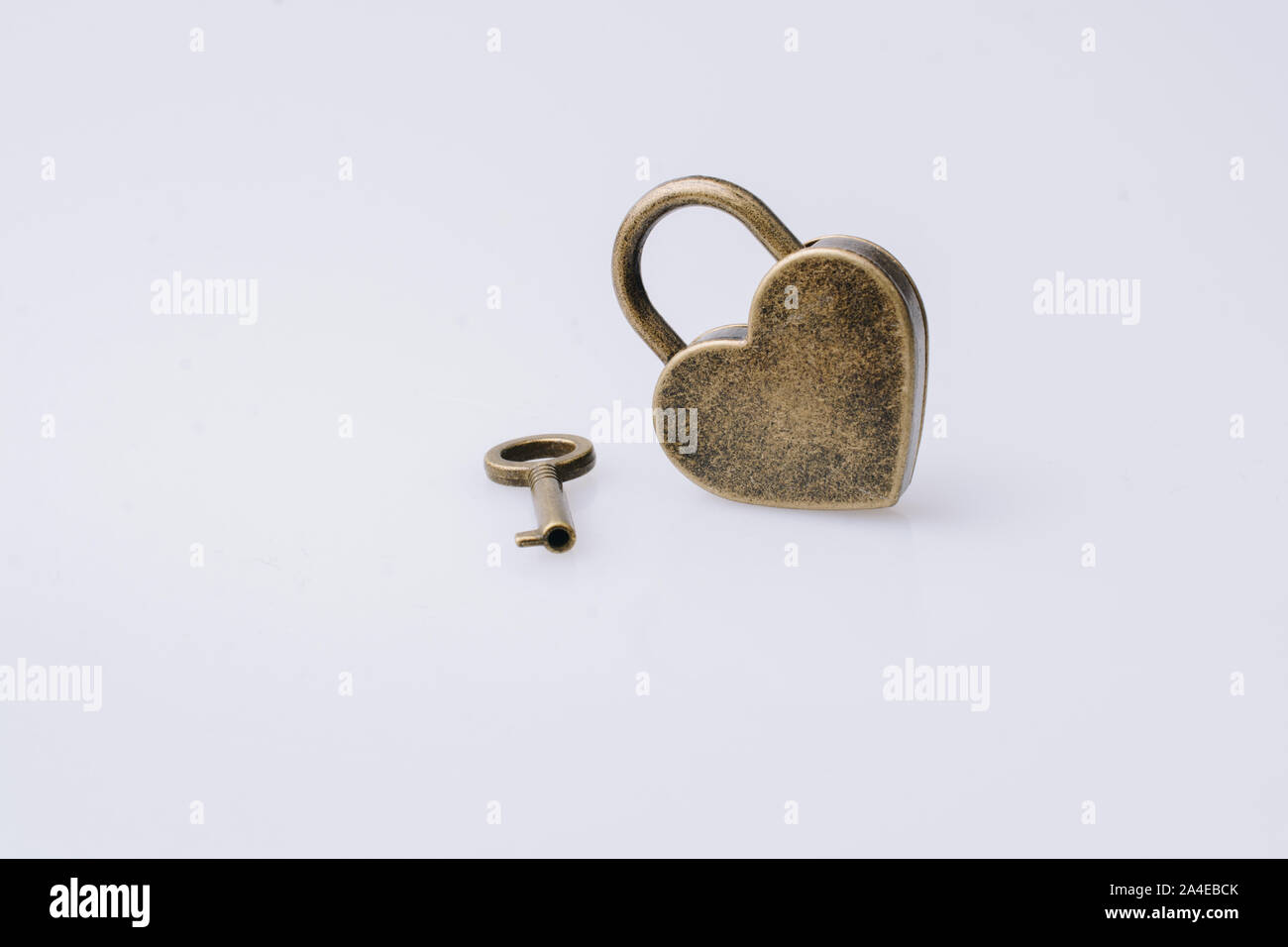 Metal padlock in heart shape as symbol of love Stock Photo - Alamy