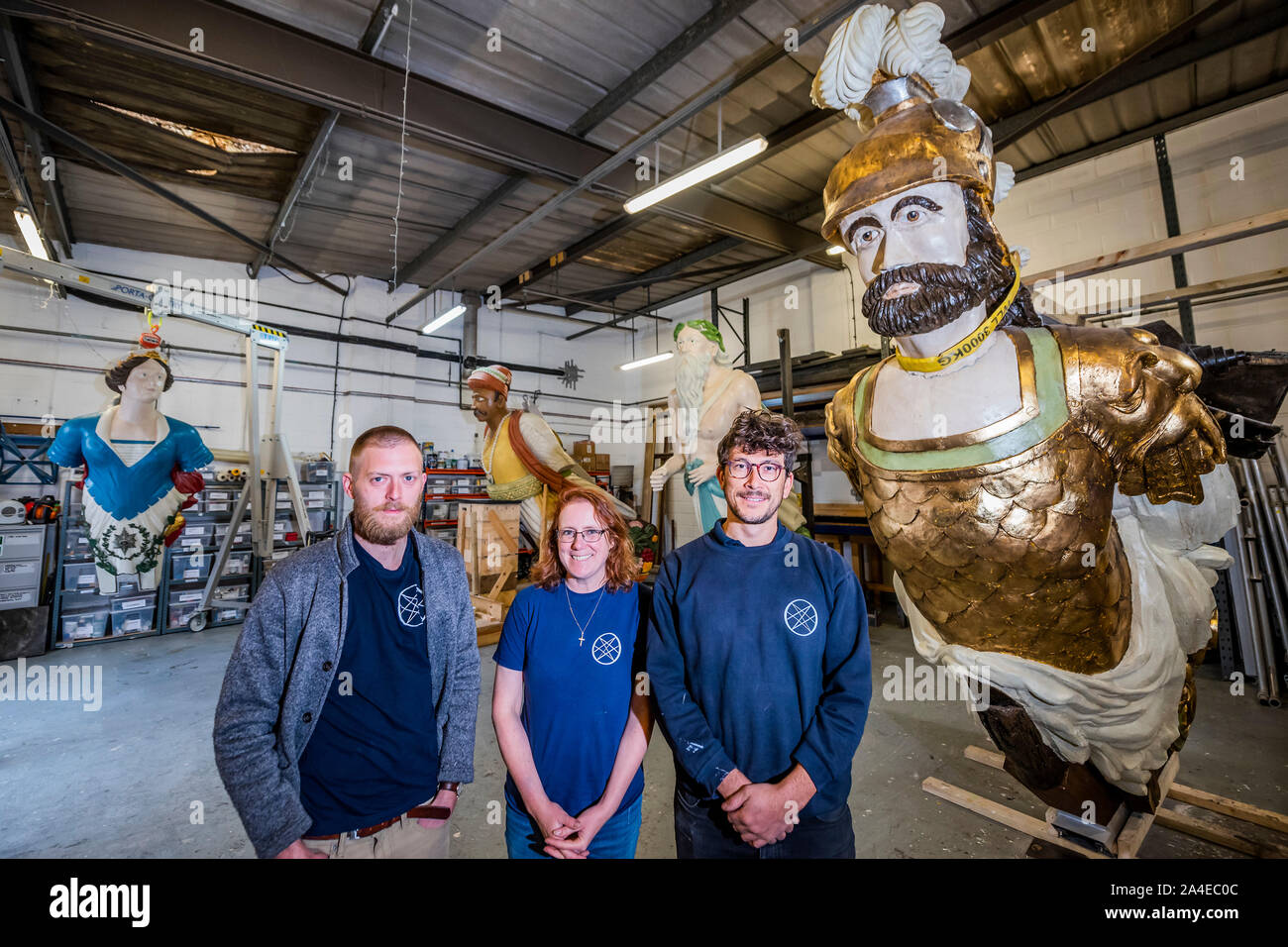 London, UK. 14th Oct, 2019. Maxwell Malden, Kirsty Walsh and Hans Thompson  (restorers and owners of the company) with HMS Topaz, HMS Calcutta, HMS  Tamar and HMS Defiance - 14 historical ships
