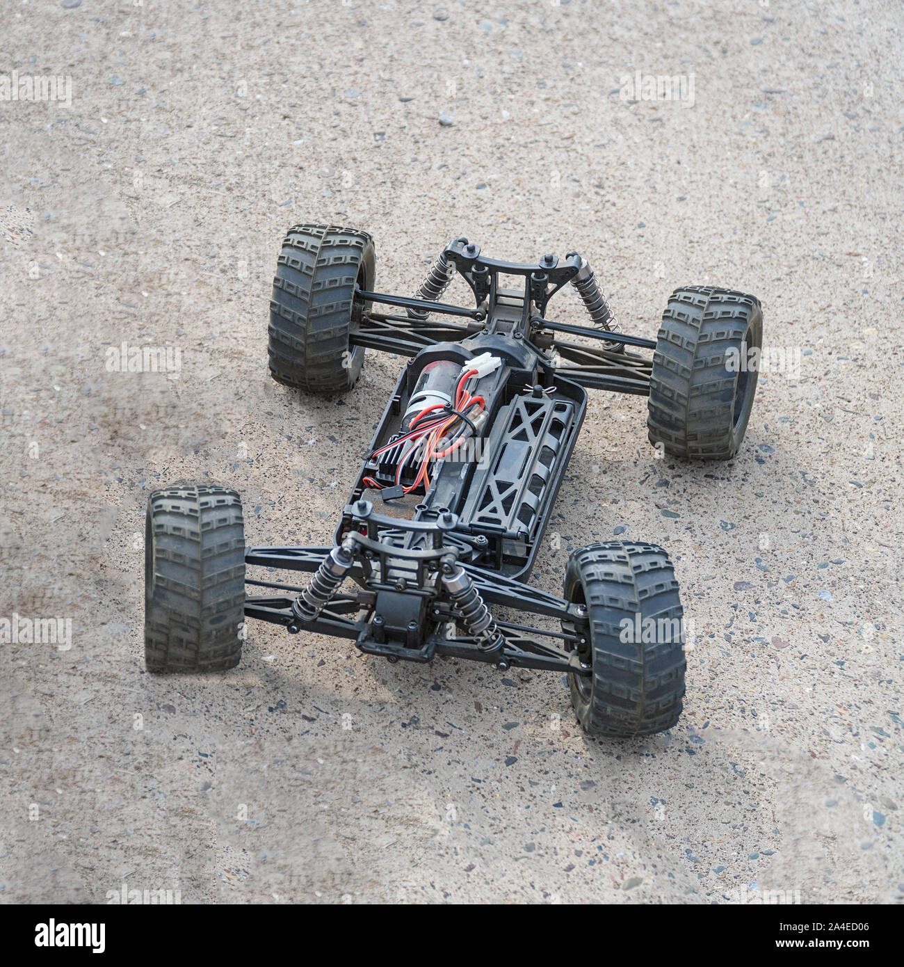 Disassembled RC model racing cars. Model cars without top. Radio