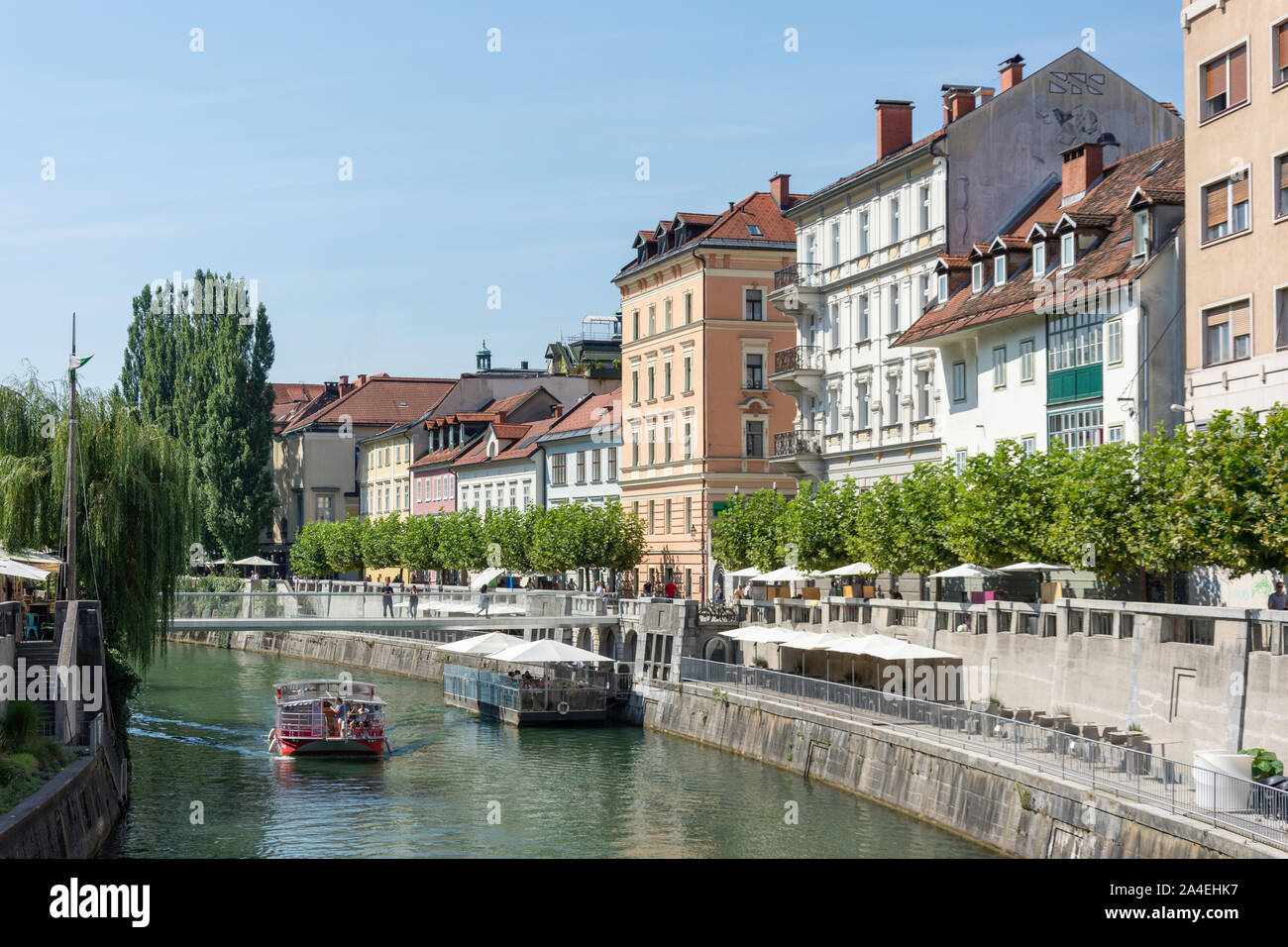 Sightseeing boat on Ljubljanica River, Old Town, Ljubljana, Slovenia Stock Photo