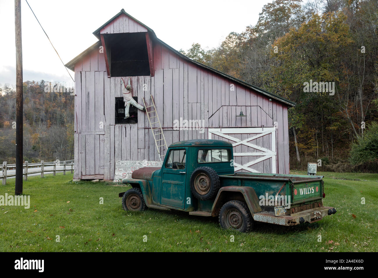 There's no need to avert your eyes. The accident in the making at this barn, next to Sharp's Country Store in Slaty Fork, an unincorporarted town in Pocahontas County, West Virginia, is a mirthful illusion Stock Photo