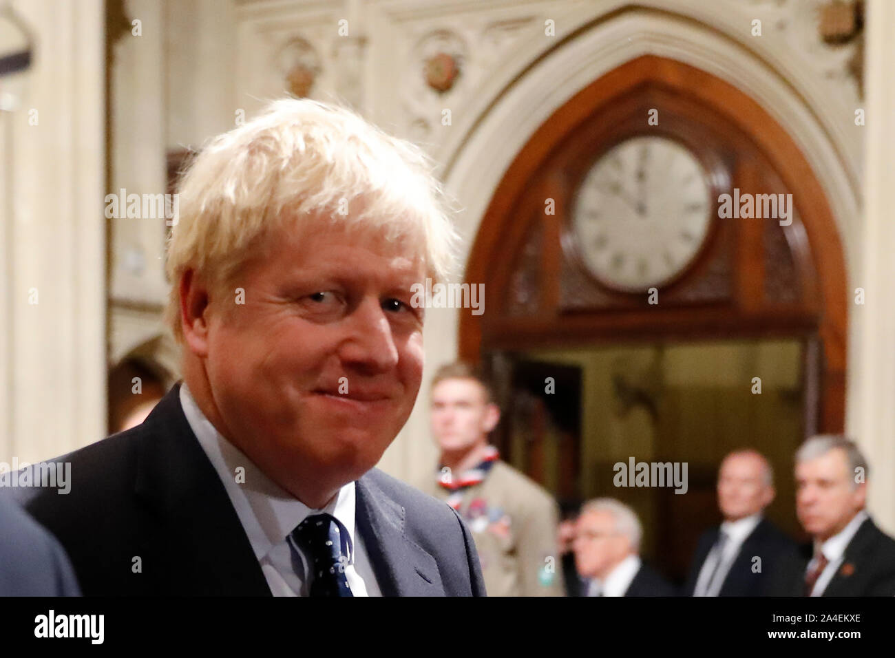 Prime Minister Boris Johnson walks back through the Peers Lobby after
