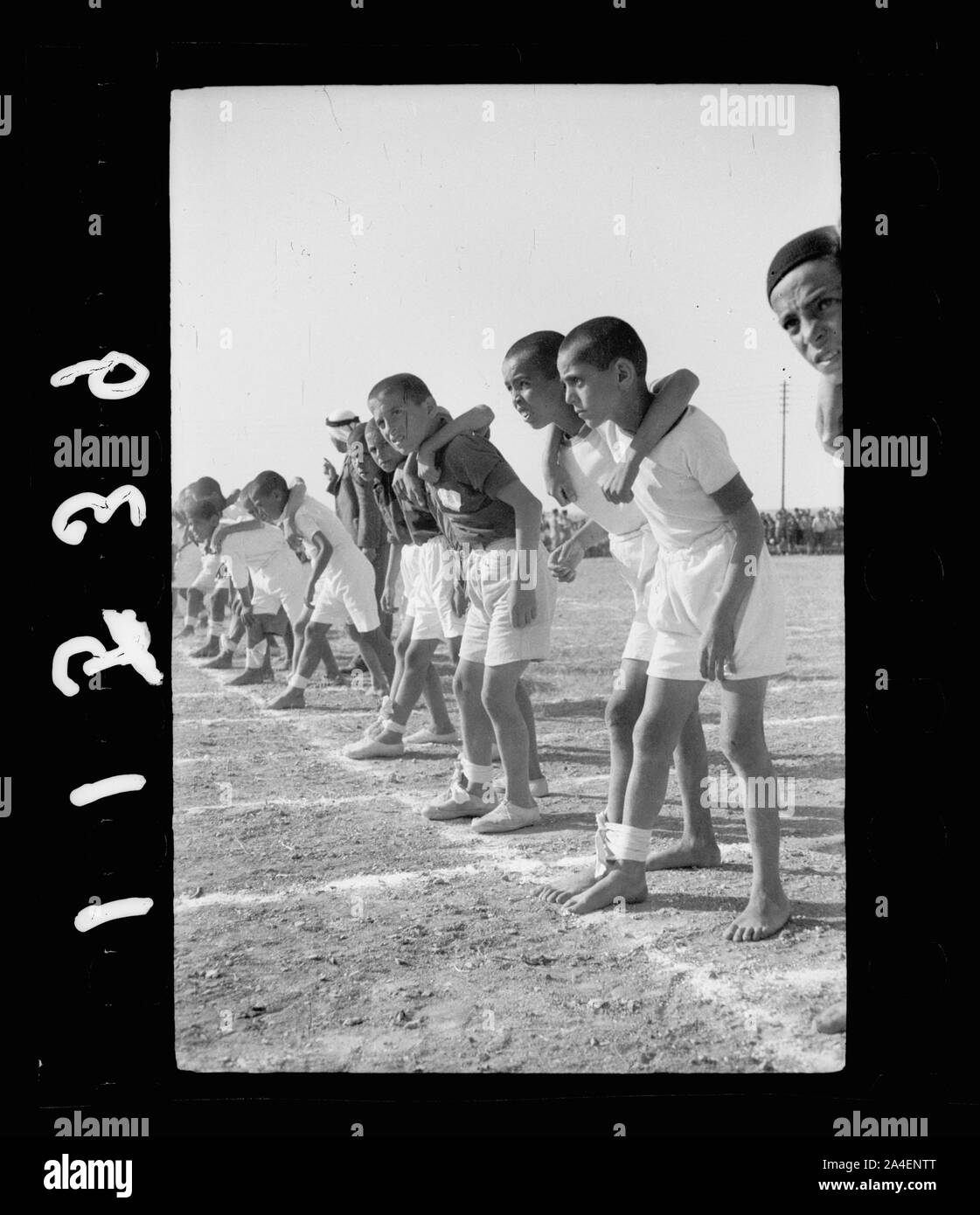 Third annual sports meeting of the government schools of the Jerusalem sub-district, on Government Arab College ground (near Government House). Three legged race, ready to start Stock Photo