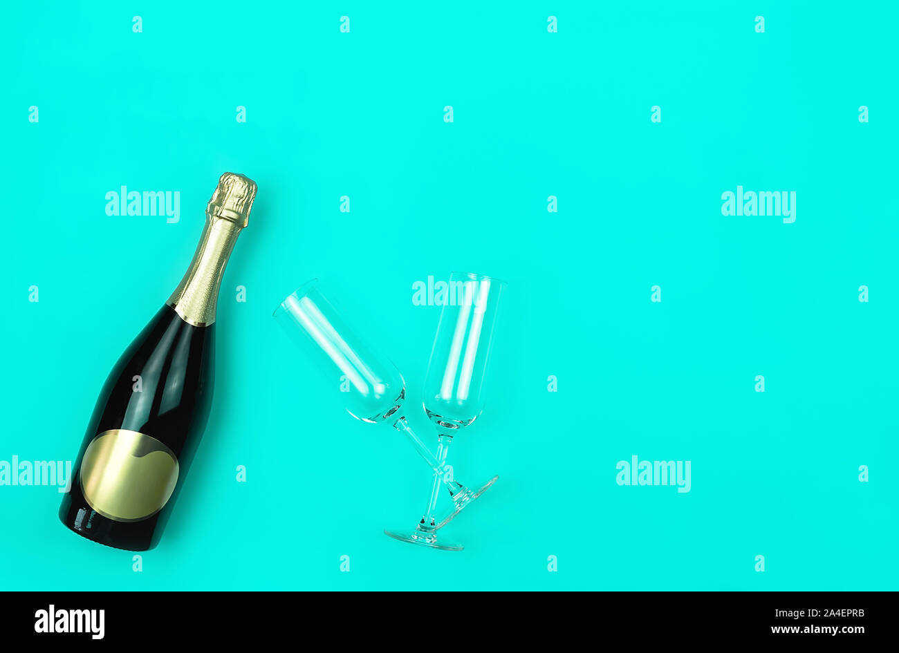 Download Champagne Bottle And Two Glasses On Trendy Mint Background With Place For Text Flat Lay Style Holiday Concept Mockup For Your Design Stock Photo Alamy