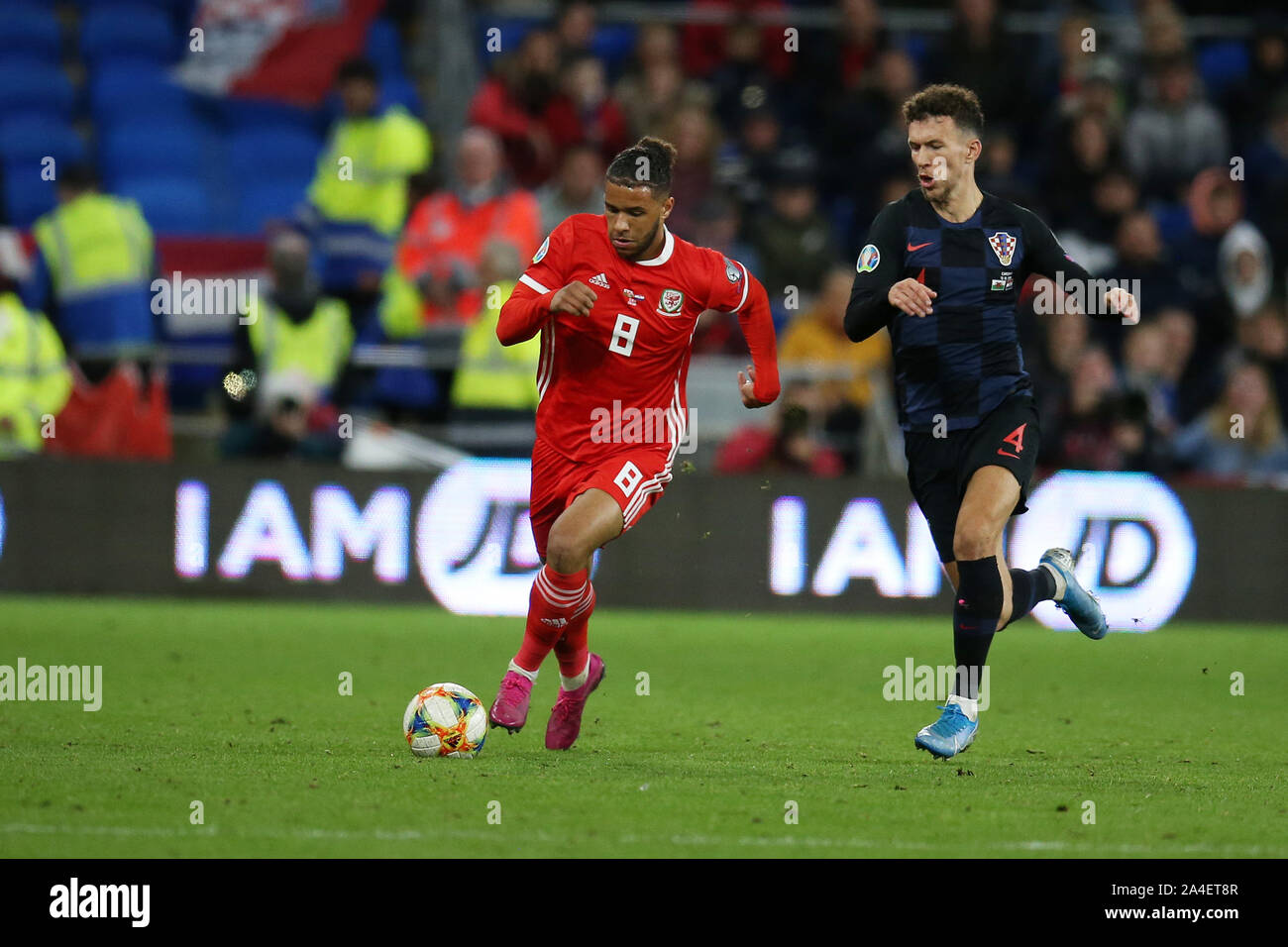 Cardiff, UK. 13th Oct, 2019. Tyler Roberts of Wales breaks away from Ivan Perisic of Croatia.UEFA Euro 2020 qualifier match, Wales v Croatia at the Cardiff city Stadium in Cardiff, South Wales on Sunday 13th October 2019. pic by Andrew Orchard /Andrew Orchard sports photography/Alamy live News EDITORIAL USE ONLY Credit: Andrew Orchard sports photography/Alamy Live News Stock Photo
