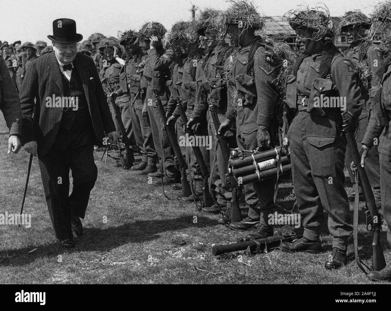 Winston Churchill inspecting British infantry prior to D-day.  May 1944 Stock Photo