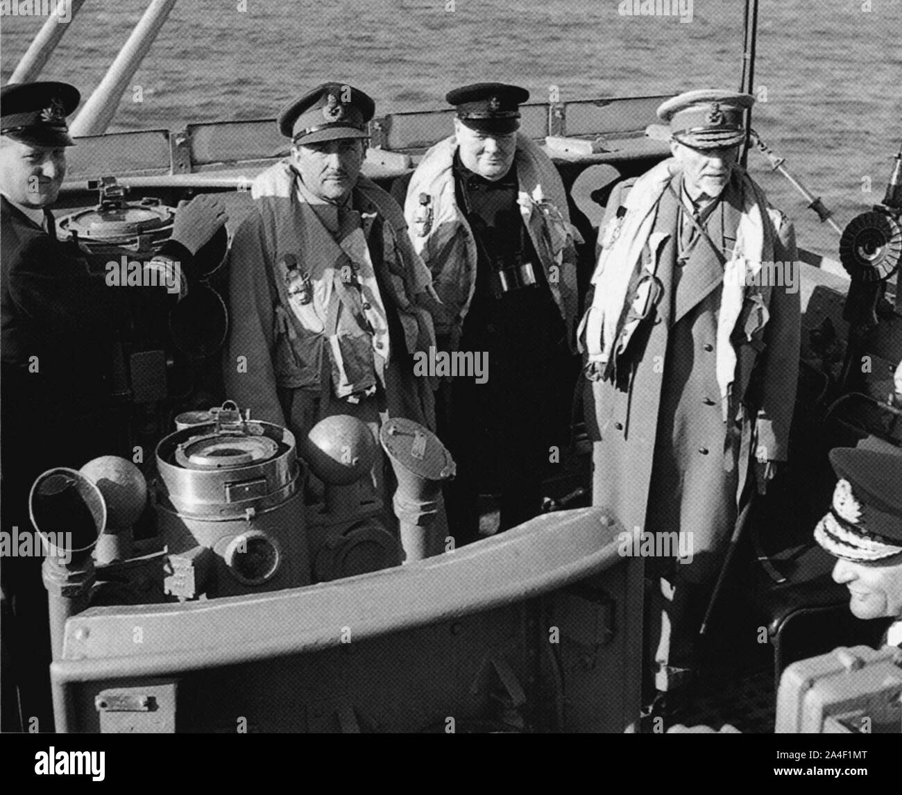 Churchill visiting the invasion beaches shortly after D-day.On his right Field Marshal Alan Brooke on left: Field Marshall Jan Smuts. 12th June 1944 Stock Photo