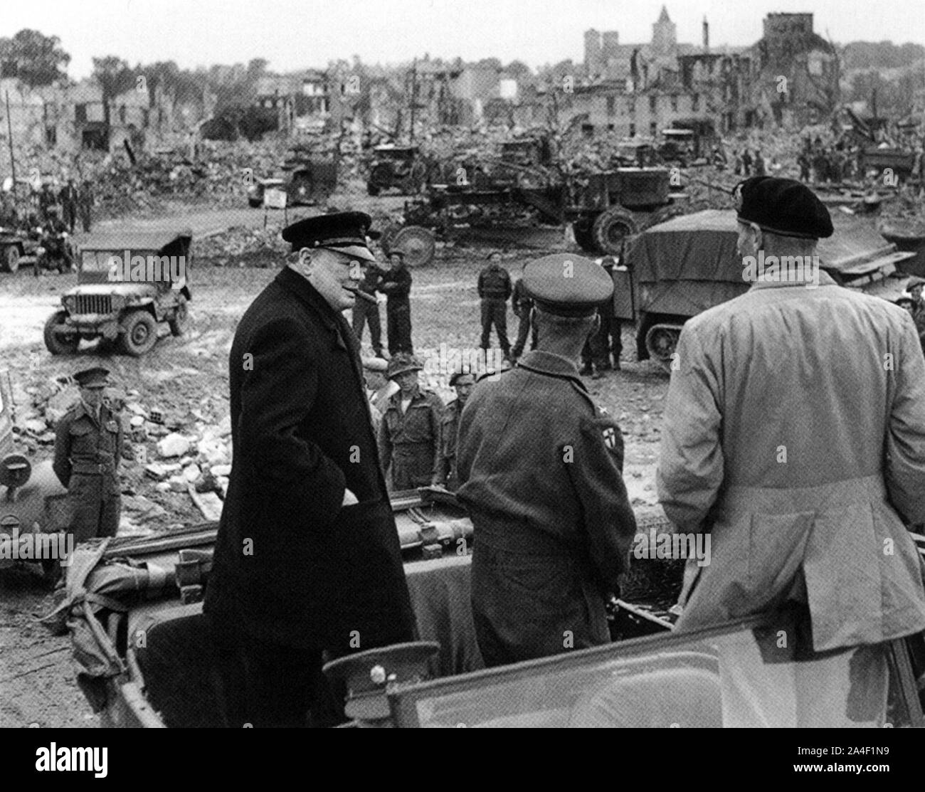 Winston Churchill visiting Caen in Normandy shortly after D-day.With him are General Sir Miles Dempsey and General Montgomery,July1944 Stock Photo