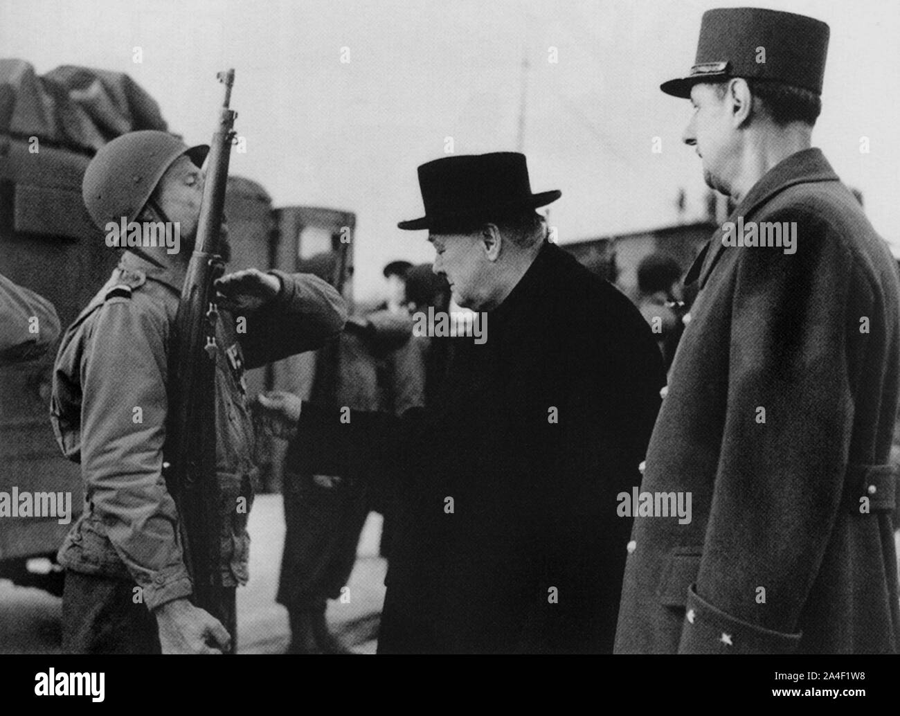 Winston Churchill with General De Gaulle inspecting a guard of honour. Paris. 11th November 1944 Stock Photo