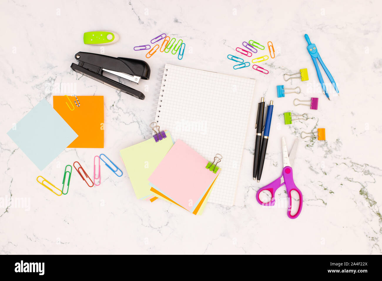 op view of office table. Office supplies on the table Stock Photo Alamy