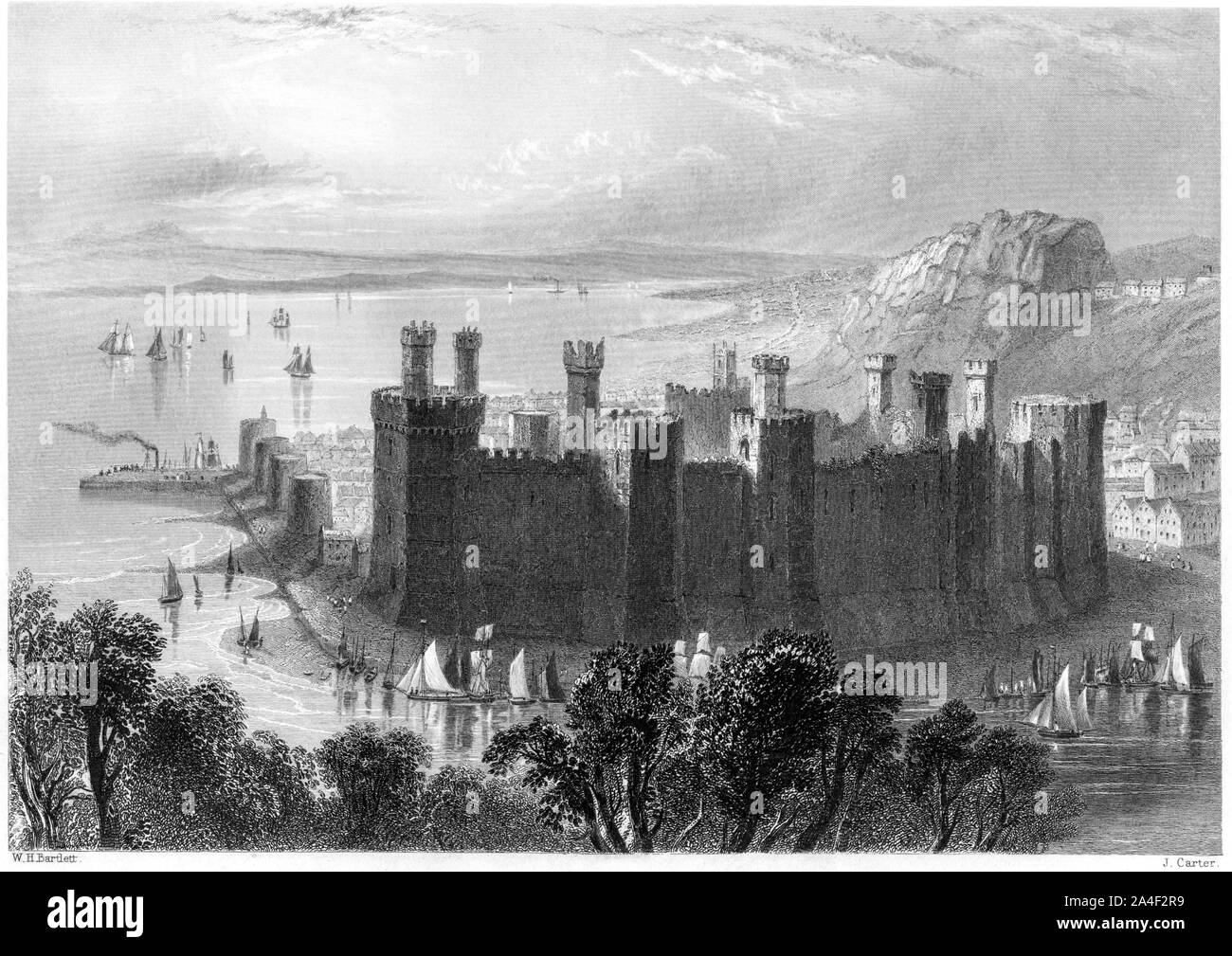 An engraving of Carnarvon (Caernarfon) scanned at high resolution from a book printed in 1842.  Believed copyright free. Stock Photo