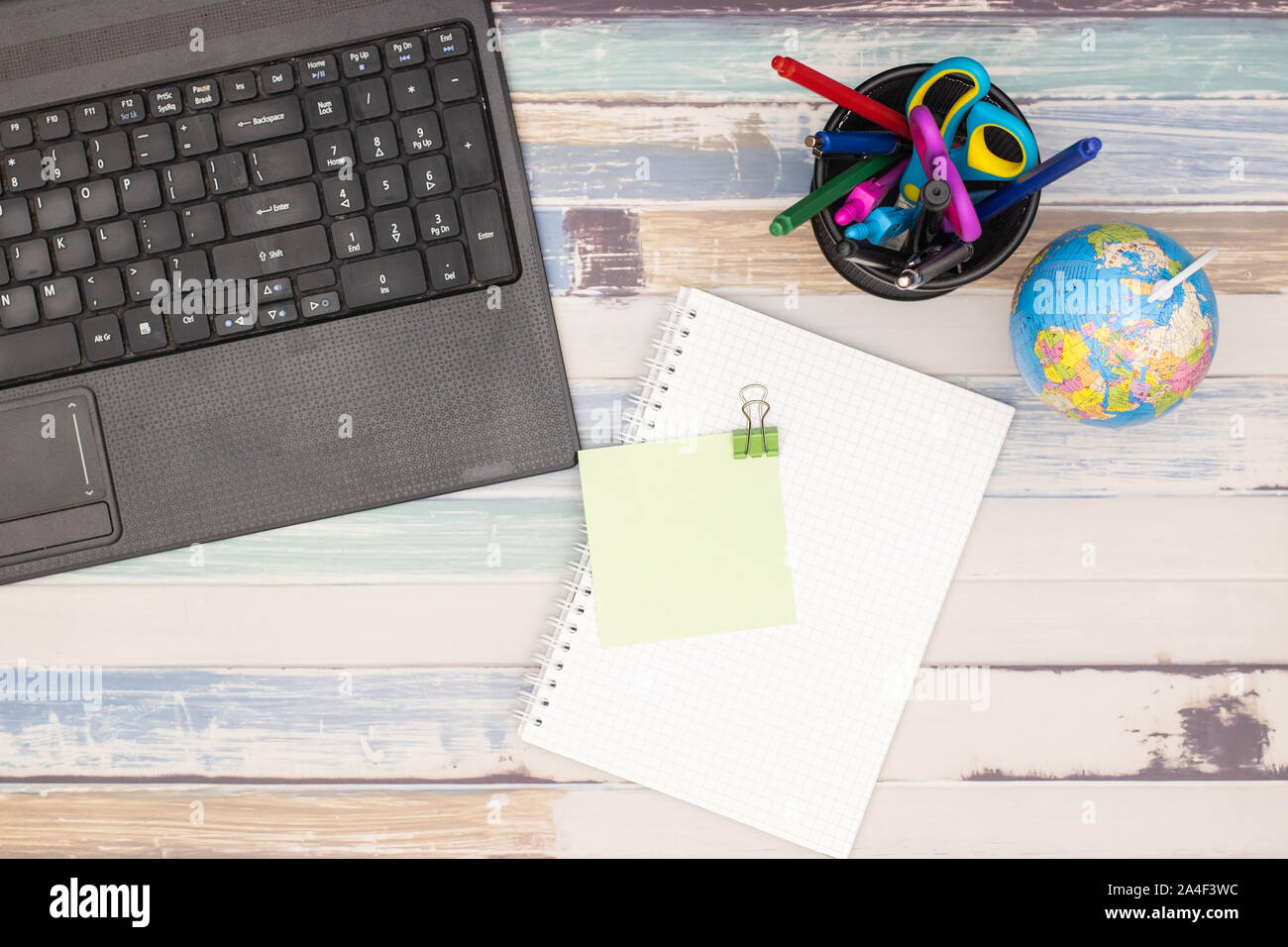 op view of office table. Office supplies on the table Stock Photo Alamy