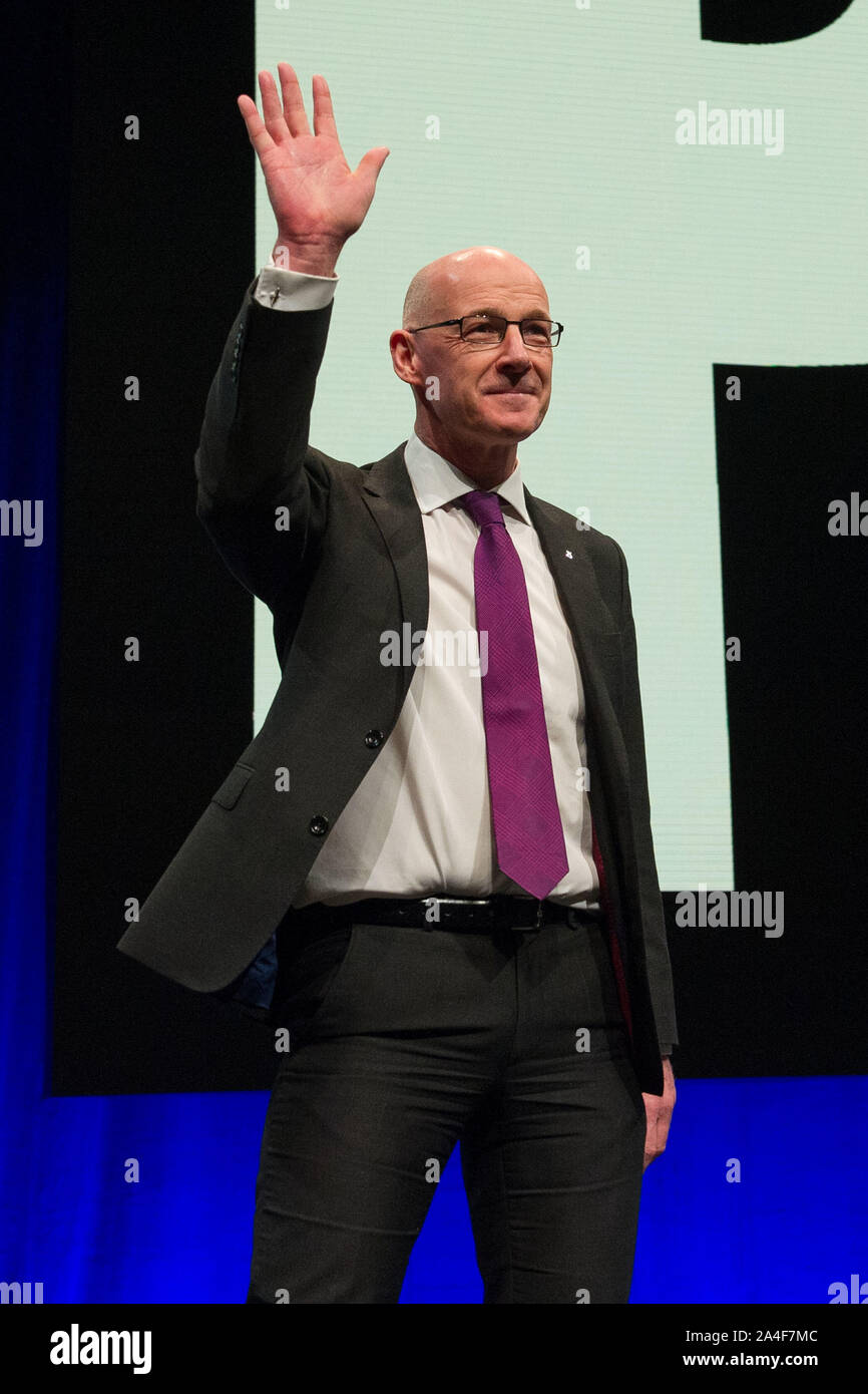 Aberdeen, UK. 14th Oct, 2019. Aberdeen, 14 October 2019. Pictured: John Swinney MSP - Depute First Minister of Scotland and member of the Scottish National Party (SNP). Keynote speech from the Depute First Minister at Scottish National Party (SNP) Conference at The Event Complex Aberdeen(TECA). Credit: Colin Fisher/Alamy Live News Stock Photo