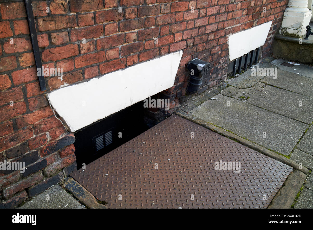 covered over basement window of a townhouse rodney street
