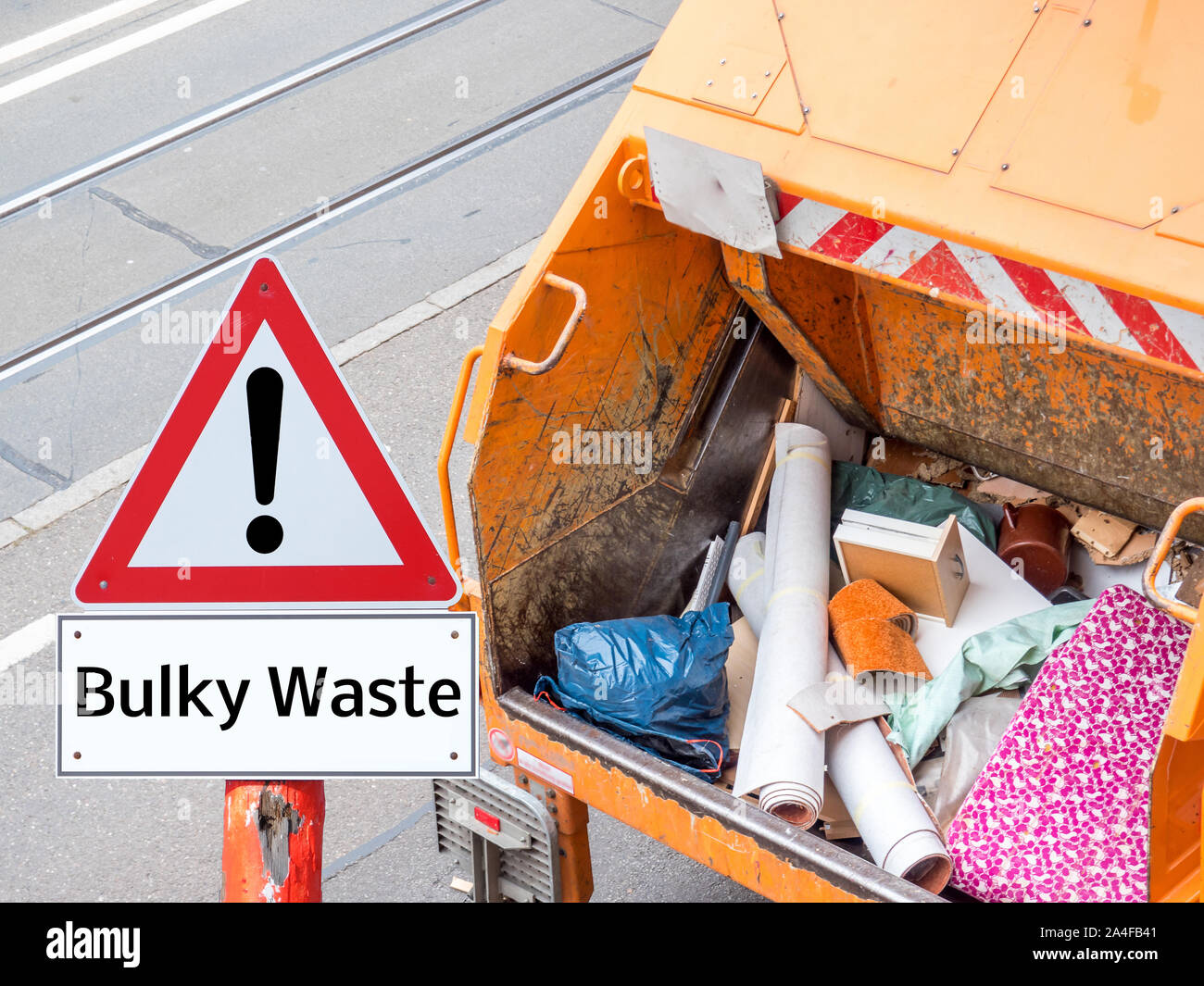 Warning sign bulky garbage with truck Stock Photo