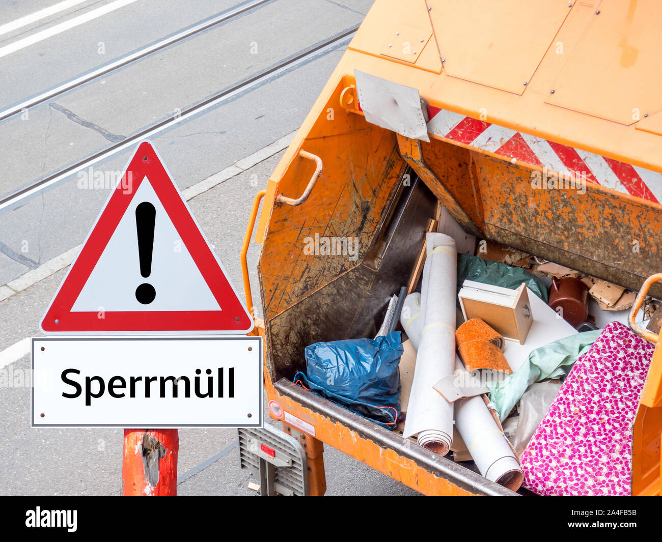 Warning sign bulky garbage with truck in German Stock Photo