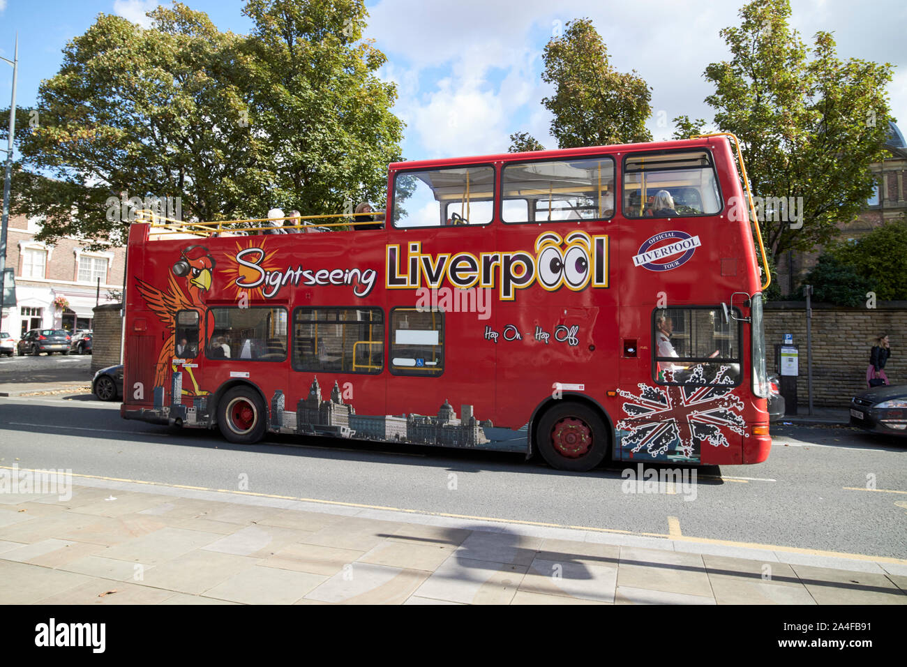 sightseeing liverpool open top double deck guided tour bus Liverpool England UK Stock Photo