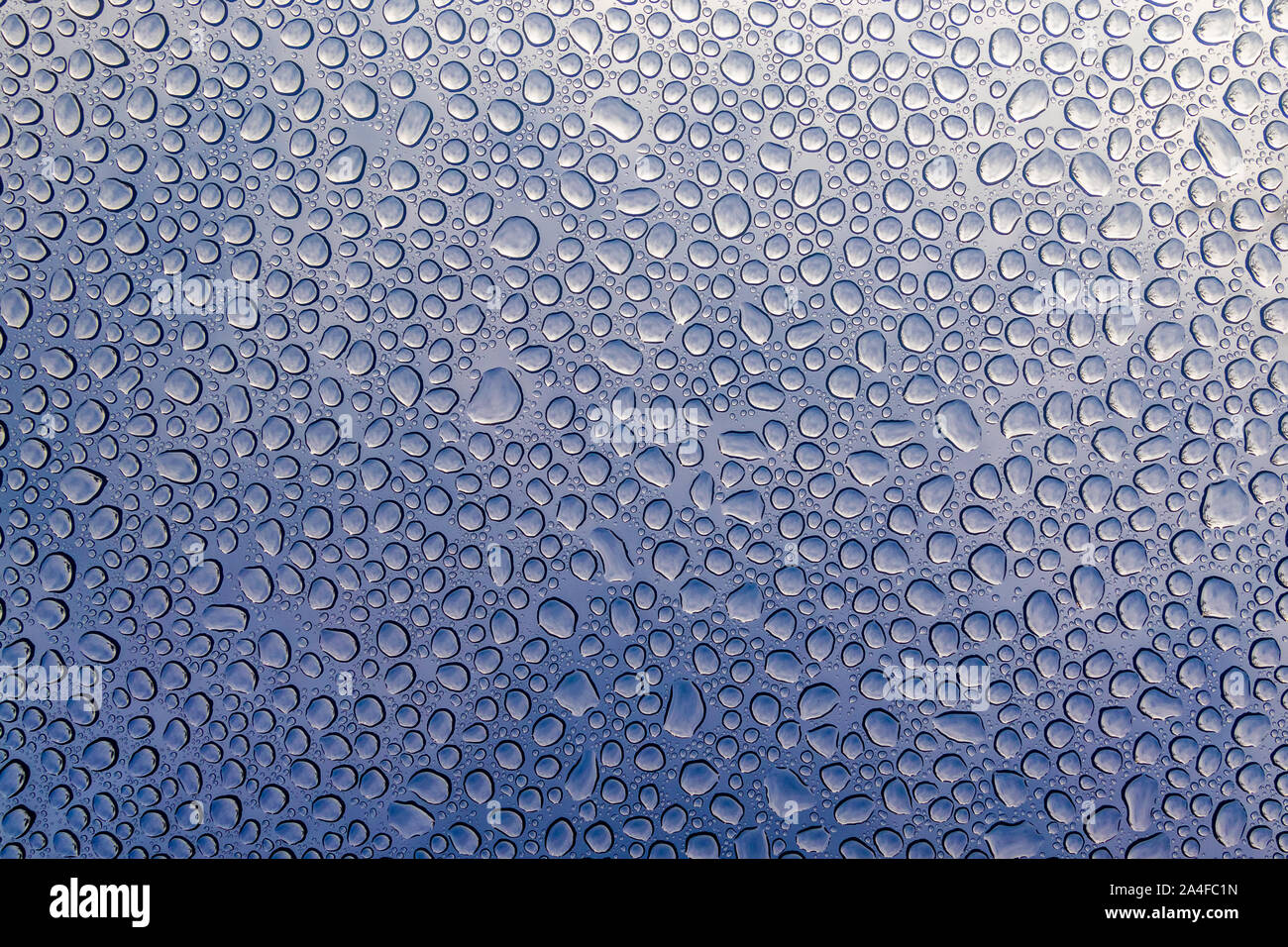 Blue Water Droplet On Glass Texture Background Stock Photo - Alamy