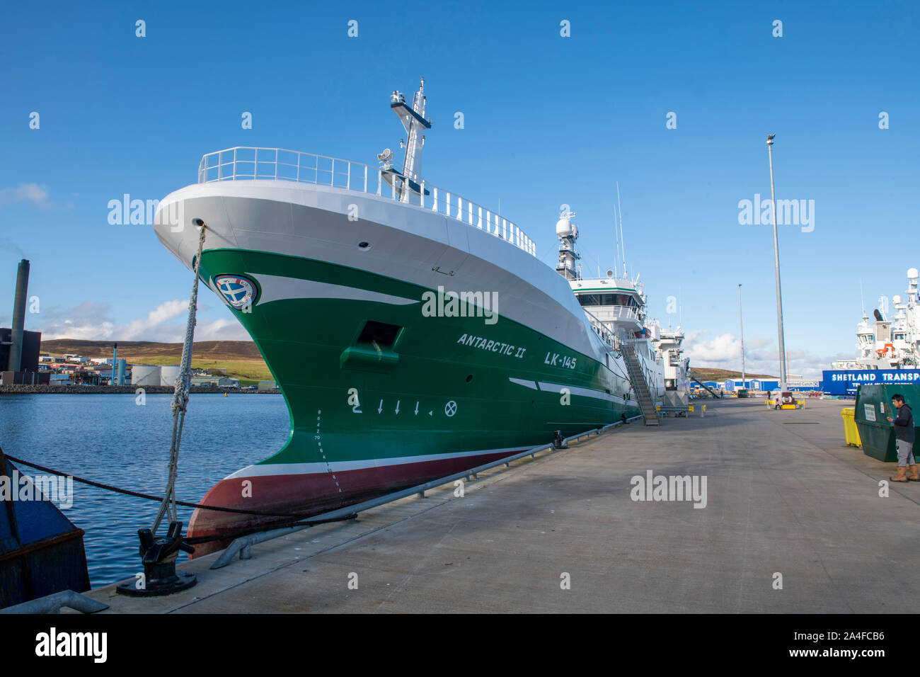 Shetland pelagic fleet and local trawlers tied up in Lerwick Shetland on a sunny day. Stock Photo