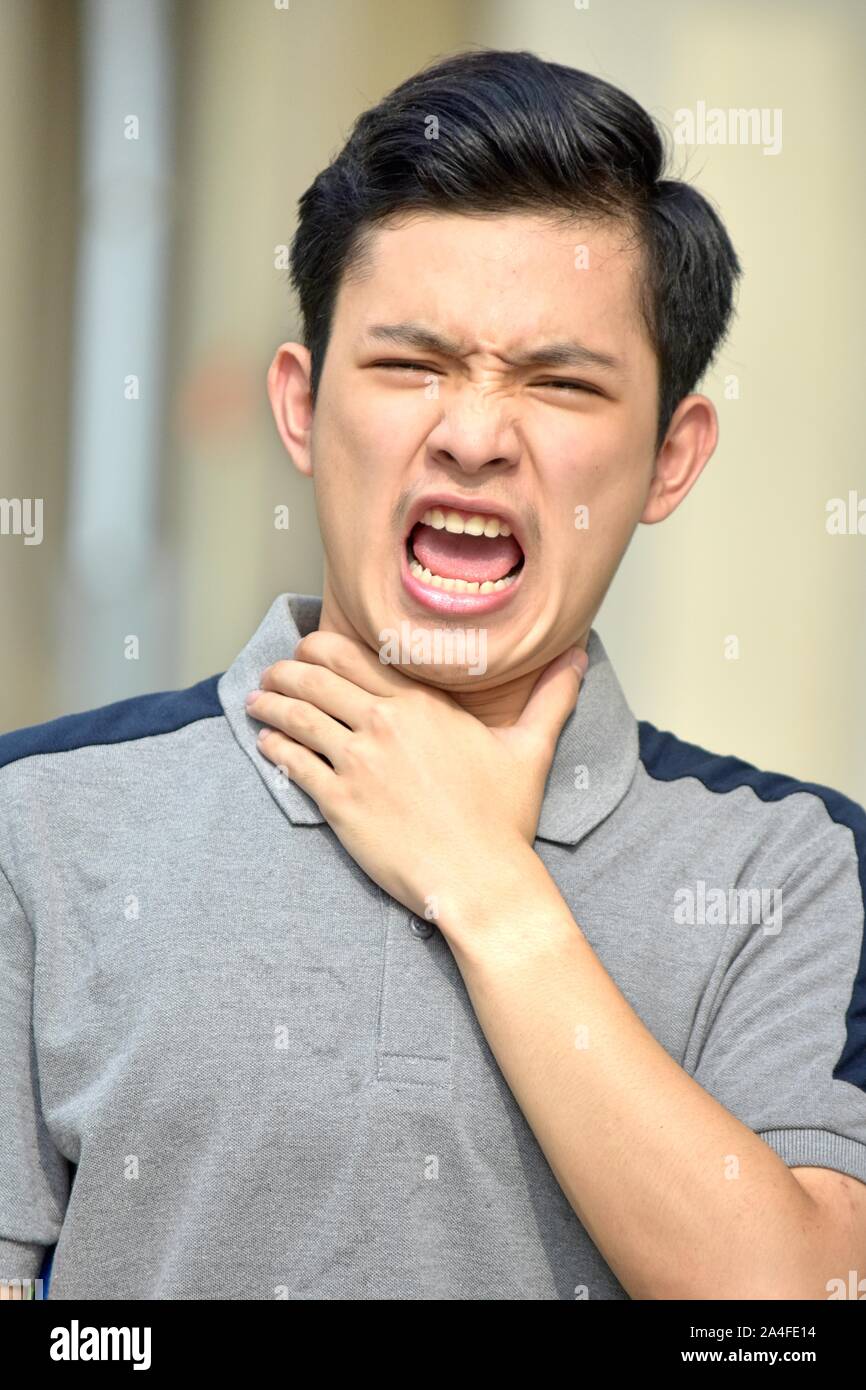 Minority Teenage Male Choking Stock Photo Alamy